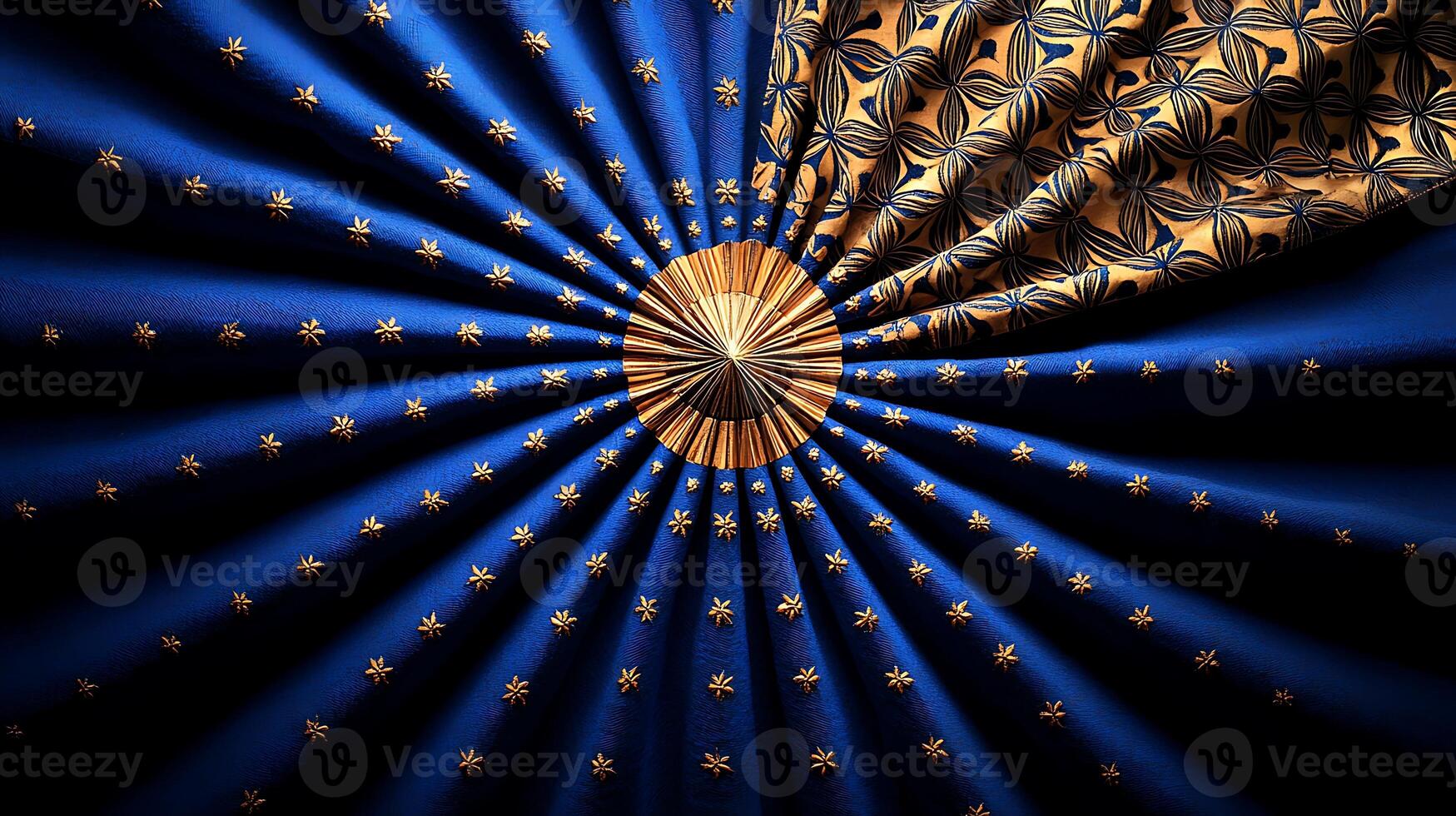 Vibrant blue and gold fabric with star patterns, showcasing intricate design and texture photo