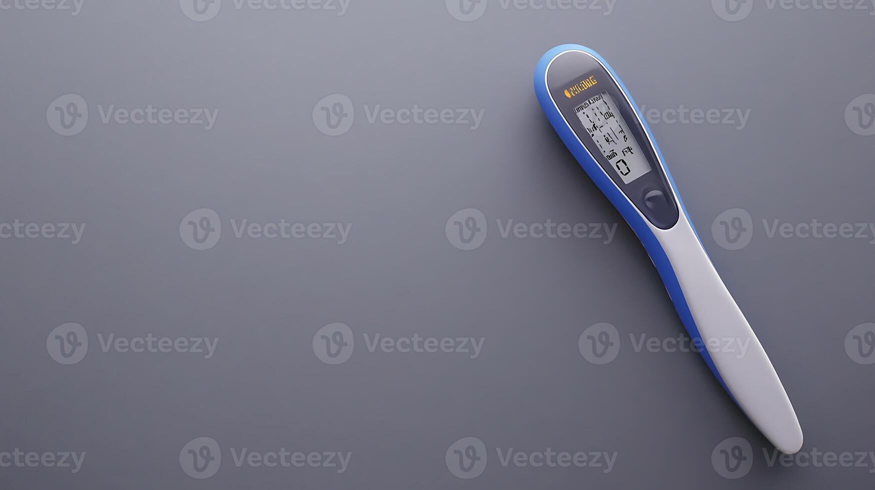 Digital thermometer on a smooth surface, showcasing its display and sleek design, ideal for medical use photo