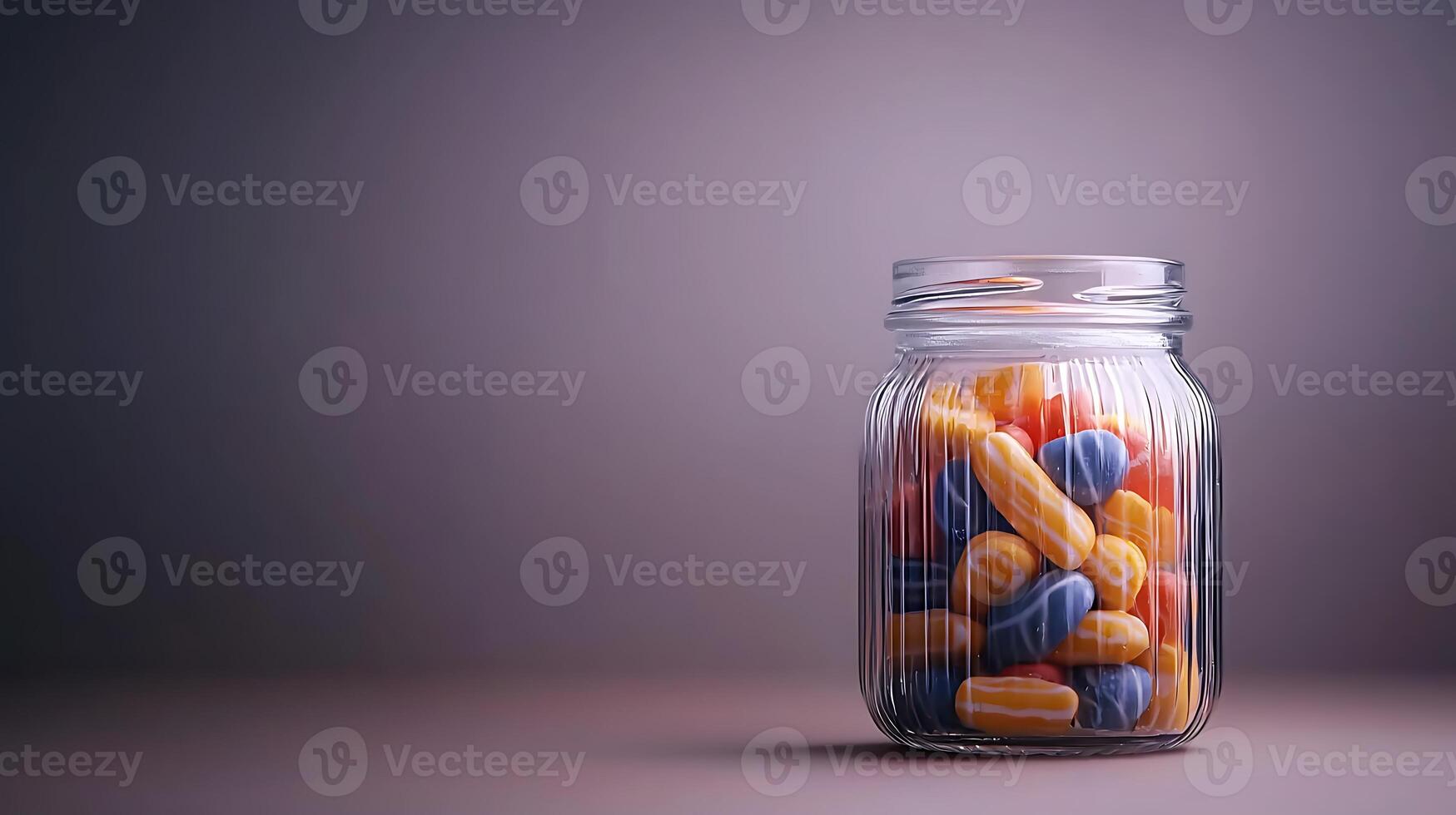 Colorful candies in a glass jar on a soft gradient background, evoking nostalgia and sweetness photo
