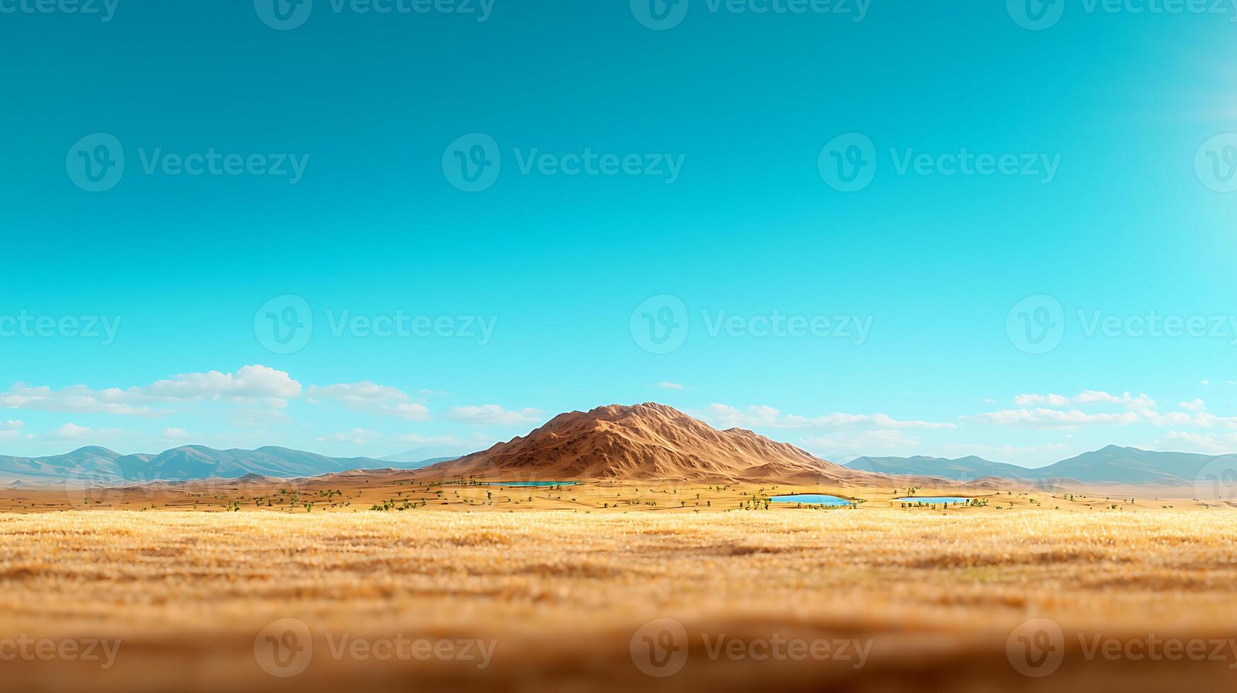 Serene desert landscape featuring a distant mountain under a clear blue sky with ponds photo