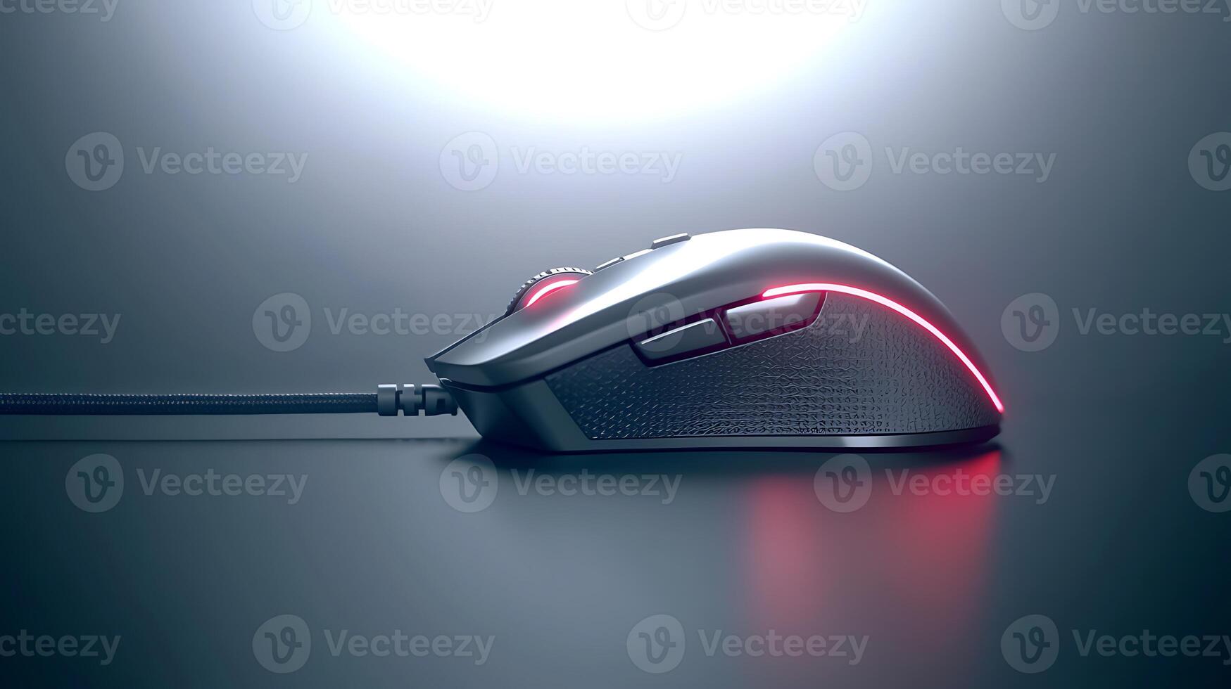 Sleek gaming mouse positioned on a smooth surface, illuminated by soft background light photo