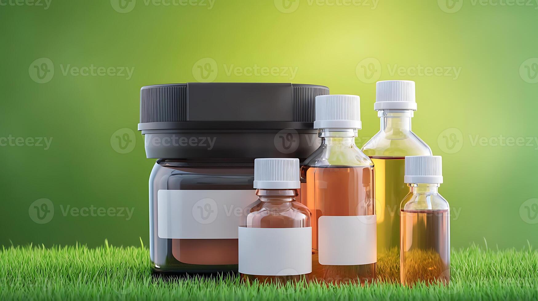 Various glass and plastic bottles filled with liquid on green grass with a blurred background photo