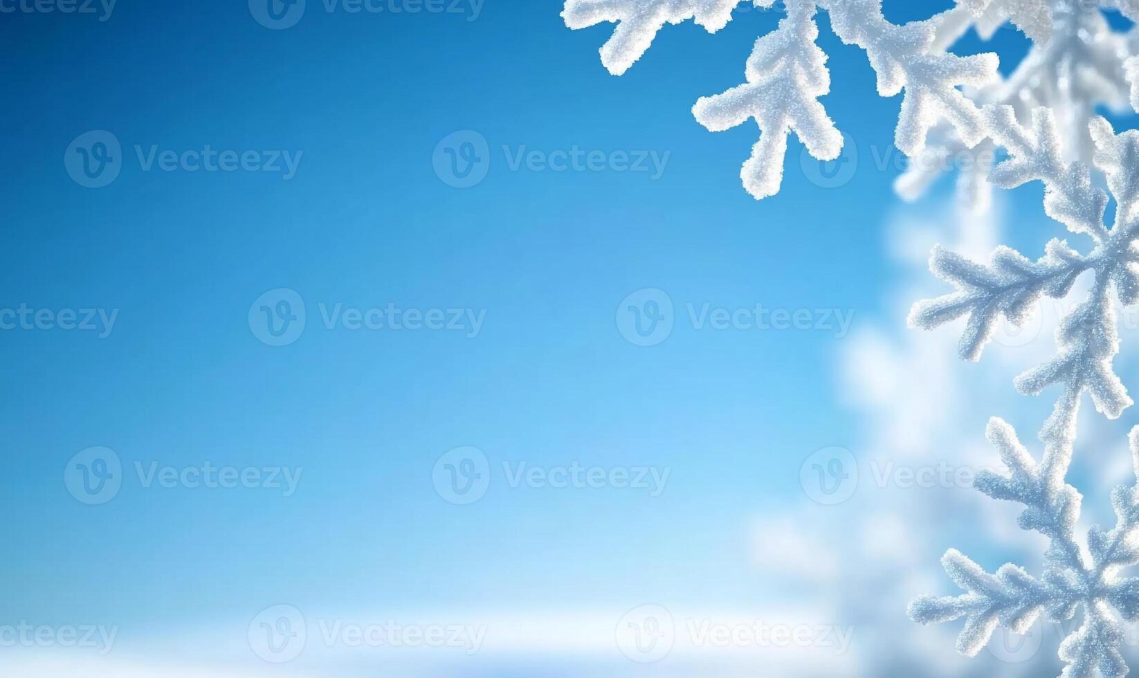 Snowflakes on a blue sky background photo