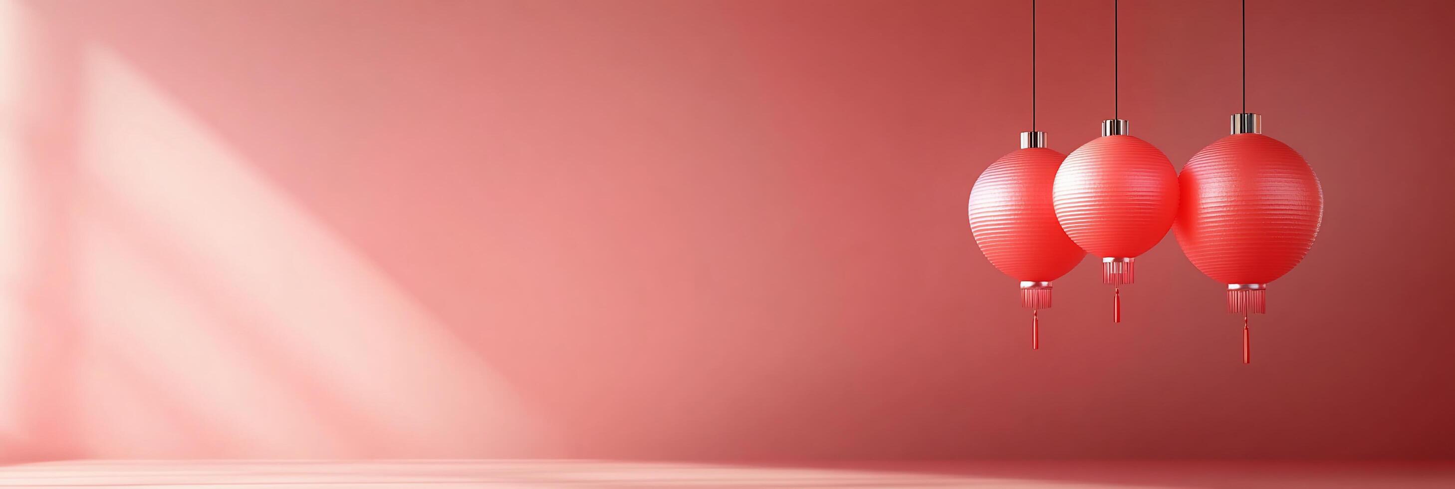 Three red lanterns hanging in a minimalist pink environment. photo
