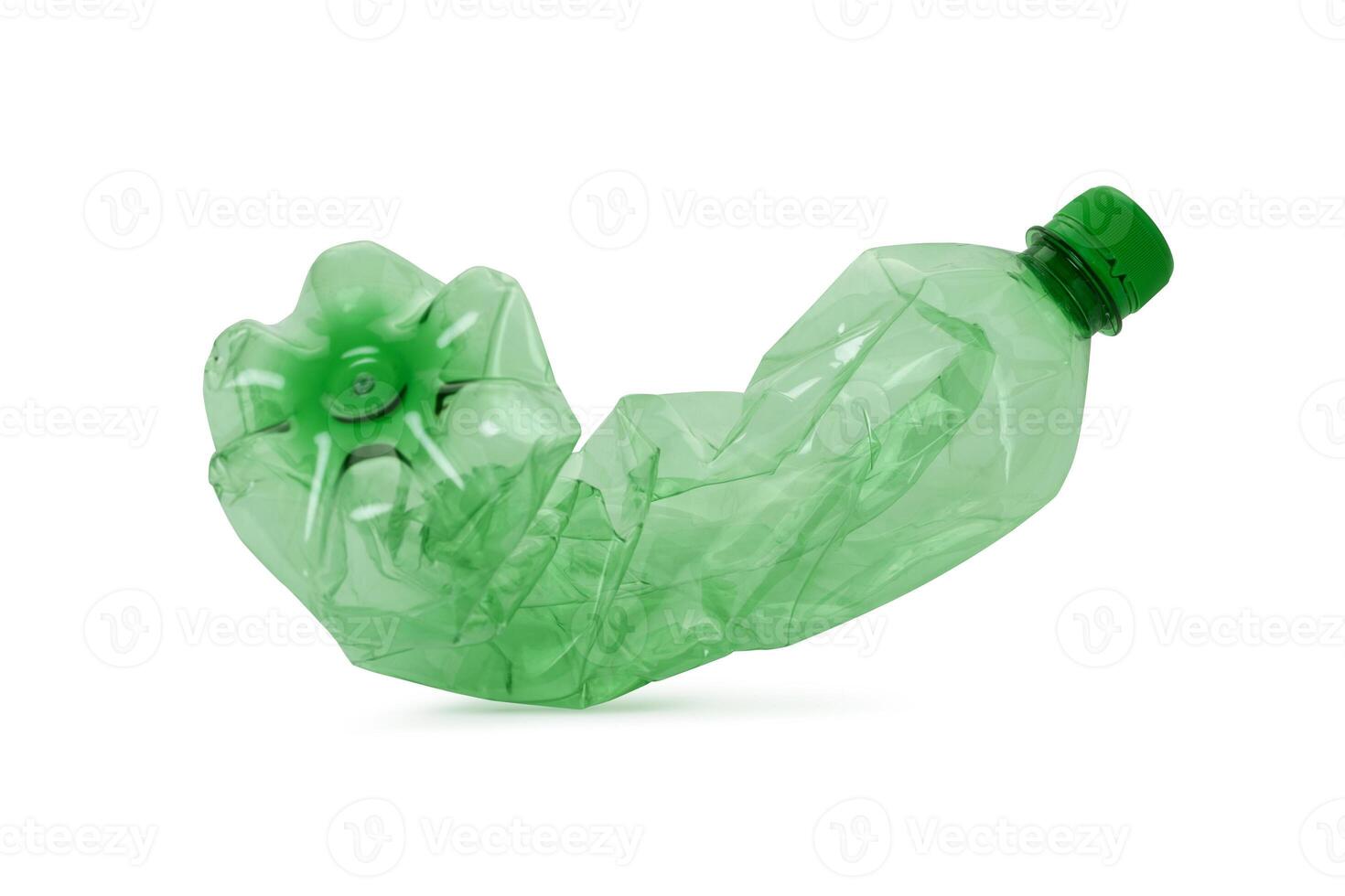 Used green plastic bottle on white bacground photo
