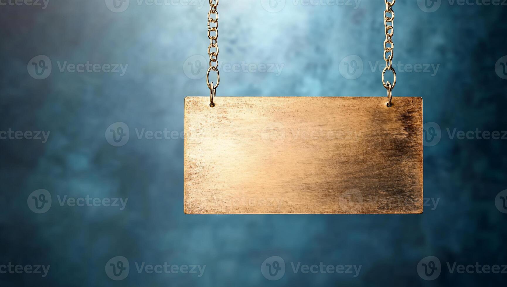 A blank metal sign hanging against a textured blue background. photo