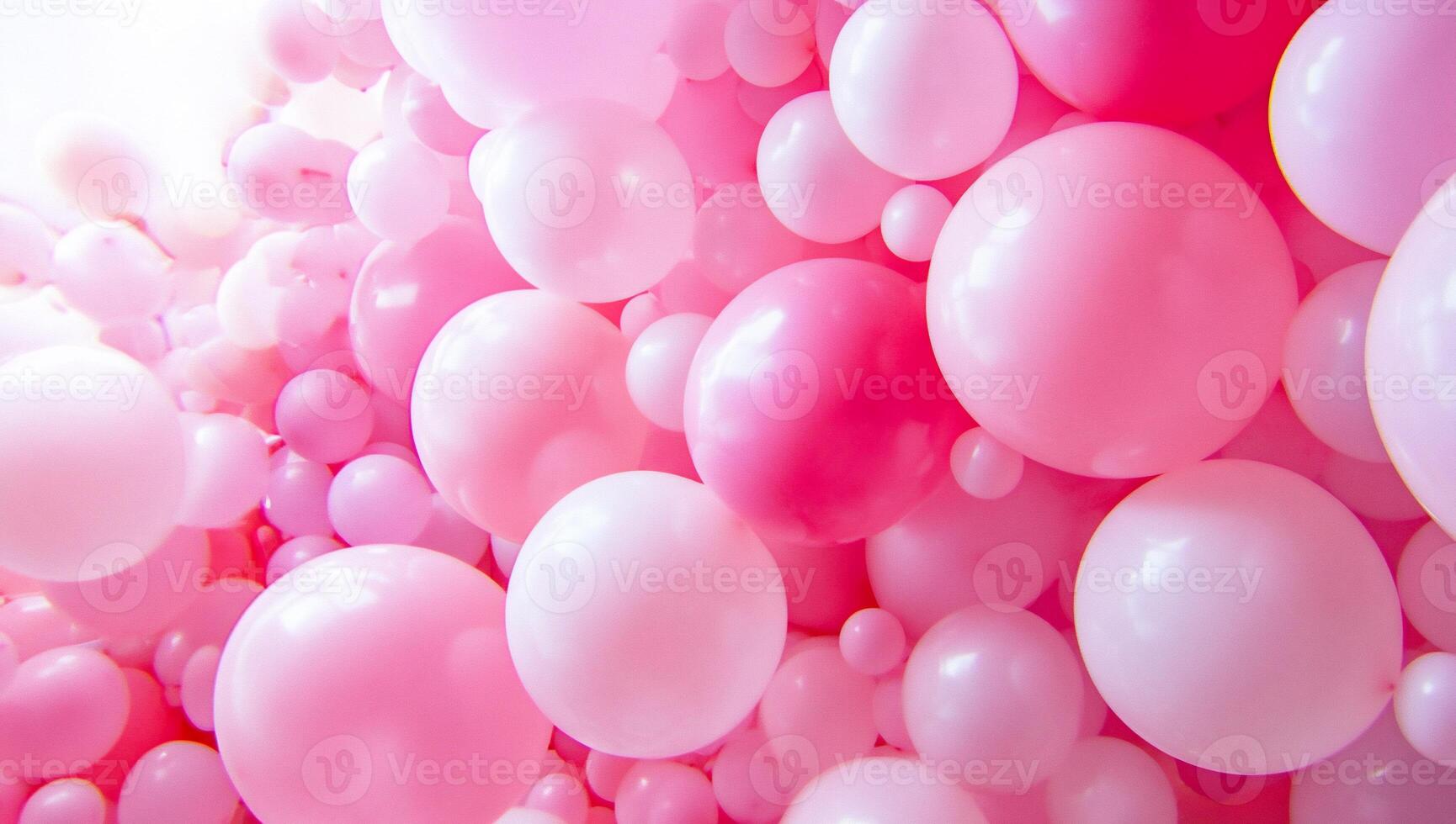 A vibrant collection of pink balloons in various sizes and shades. photo