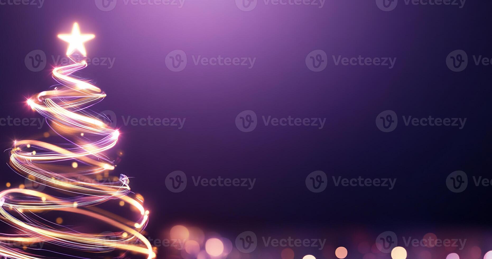 A festive Christmas tree with glowing lights and a star on top. photo