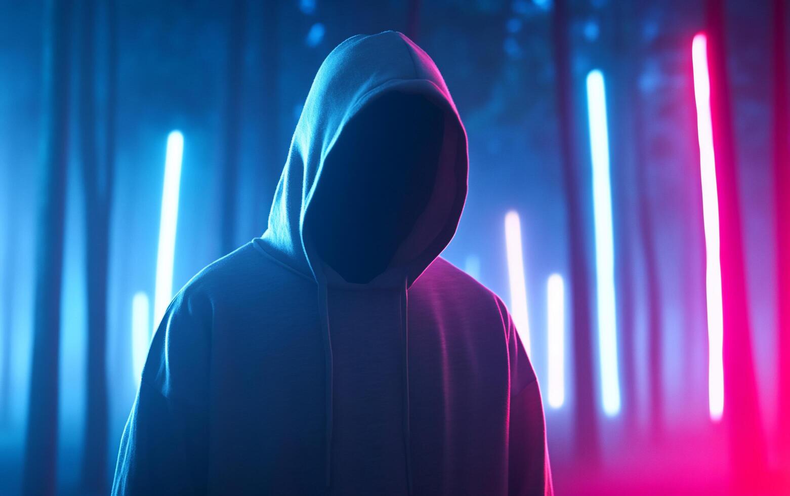 A mysterious figure in a hoodie stands amidst illuminated trees. photo