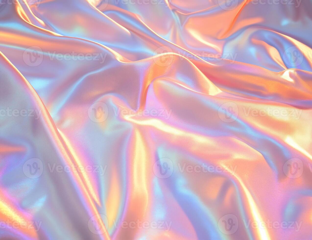 A close-up of iridescent, silky fabric with flowing textures and colors. photo