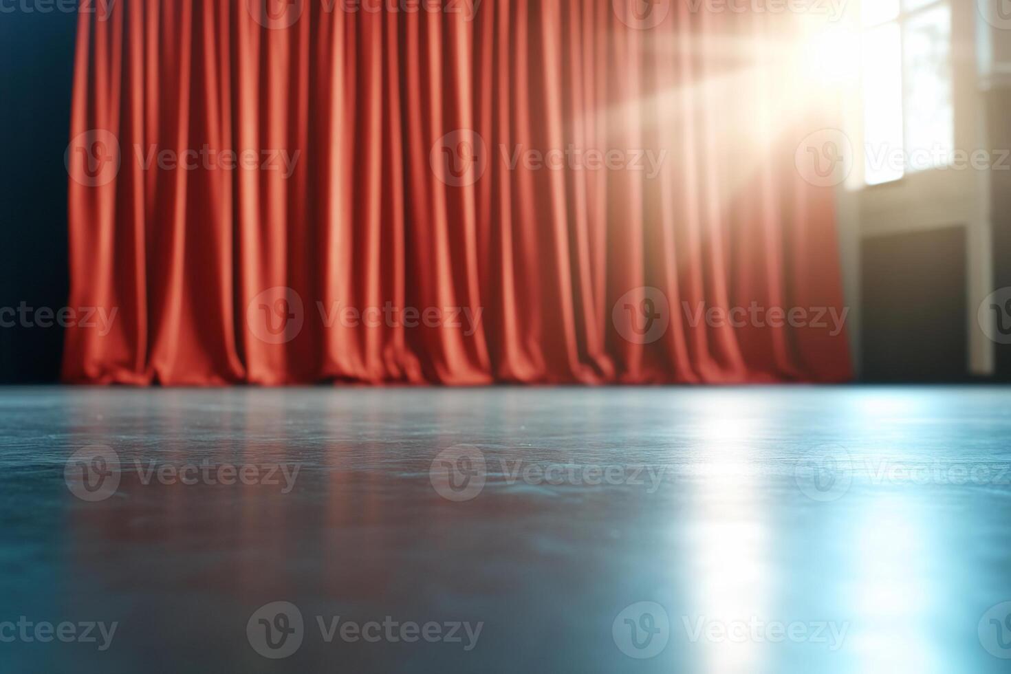 A stage with red curtains, suggesting a performance or event setting. photo
