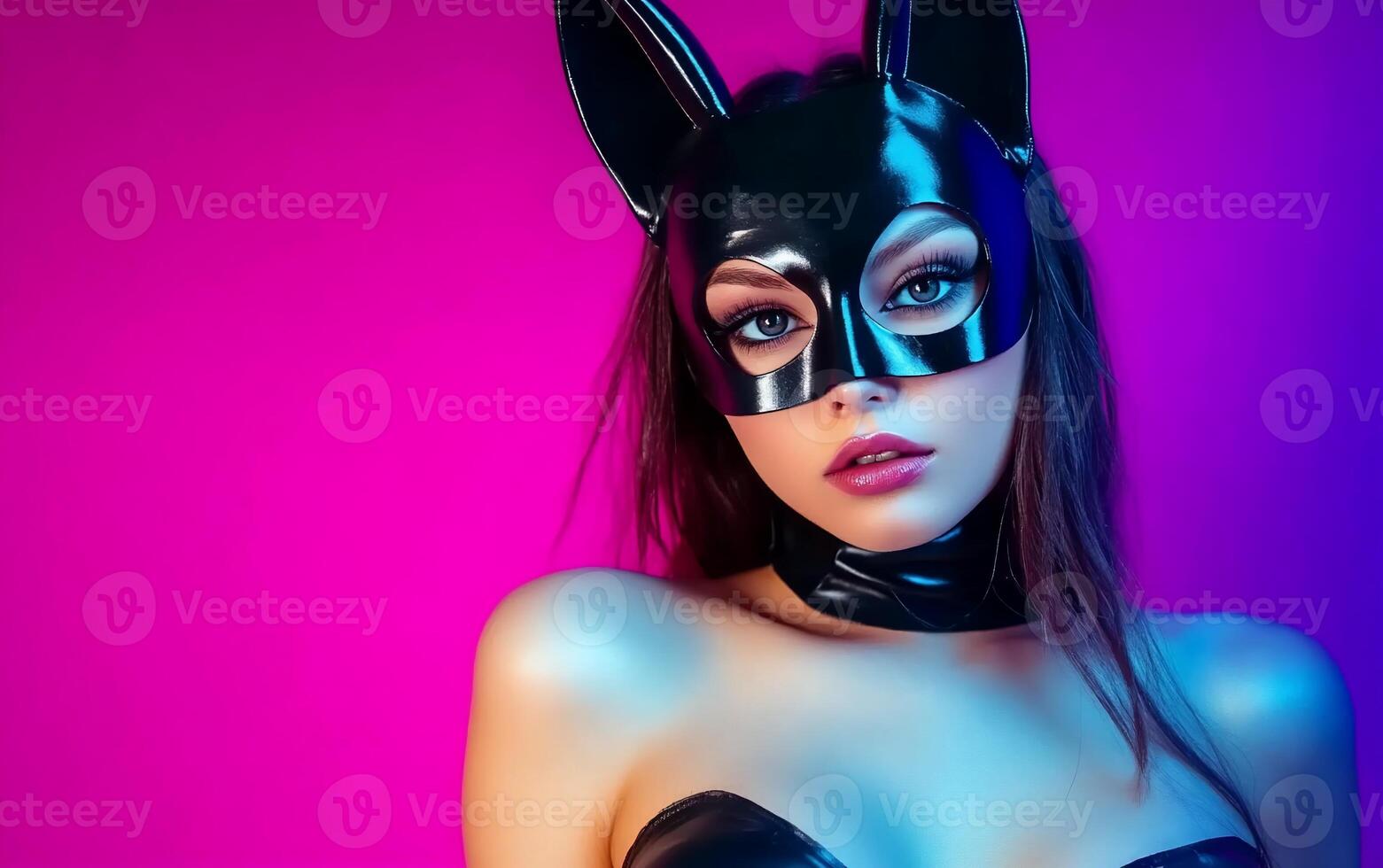 A woman in a cat mask and latex outfit photo