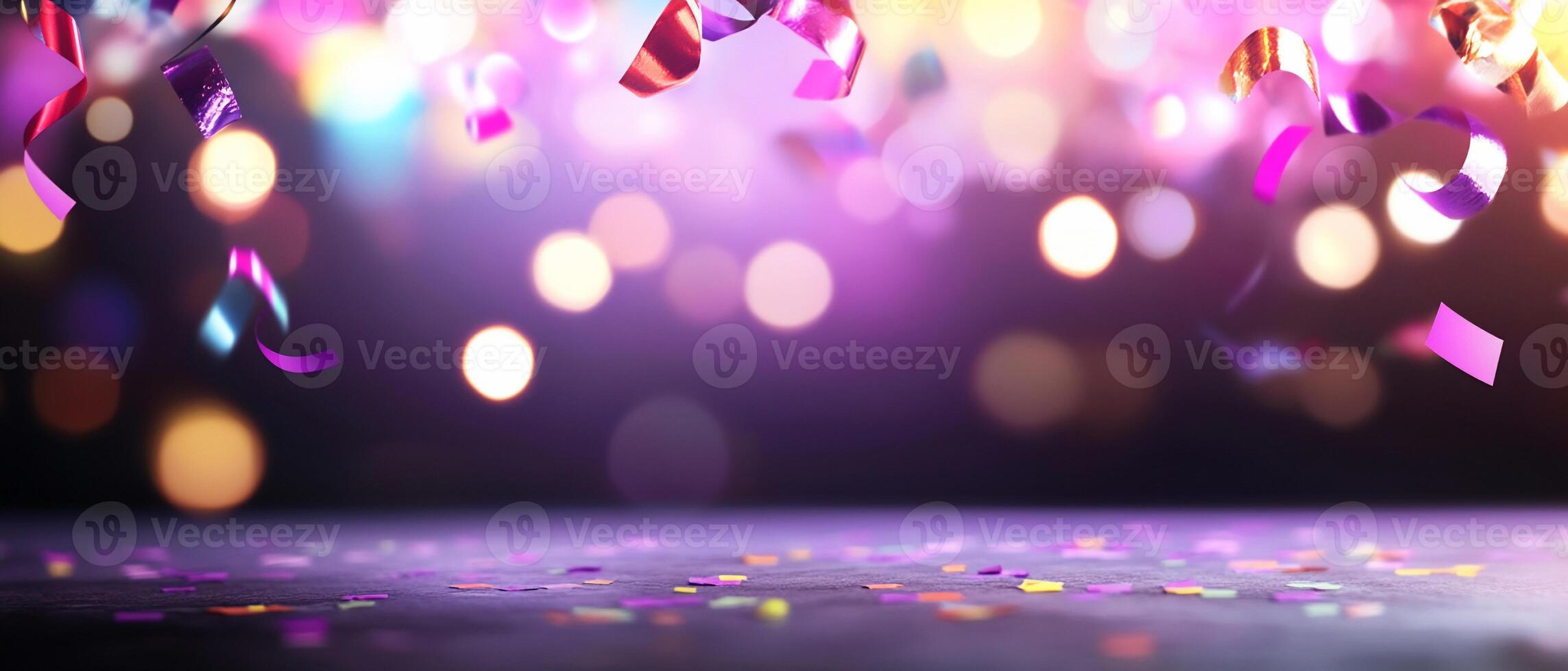 Confetti and streamers on a dark background photo