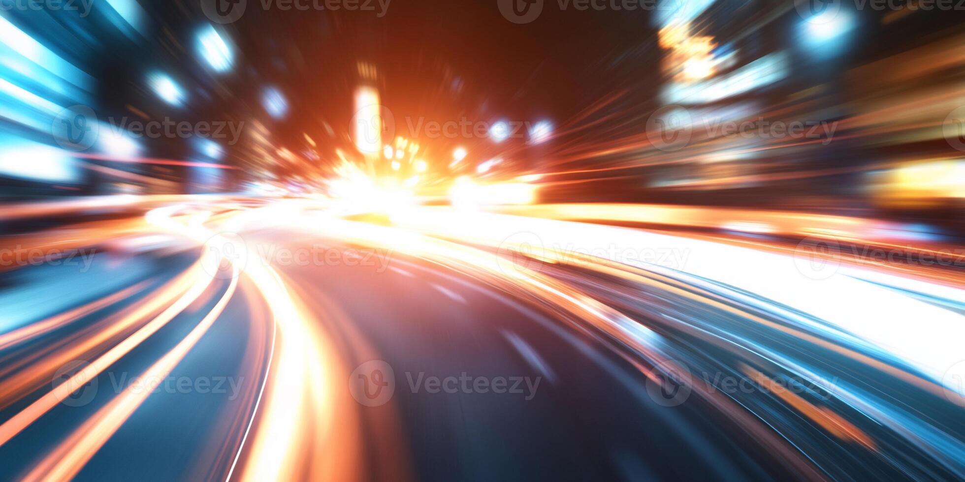 A dynamic, blurred scene of light trails on a city road at night. photo