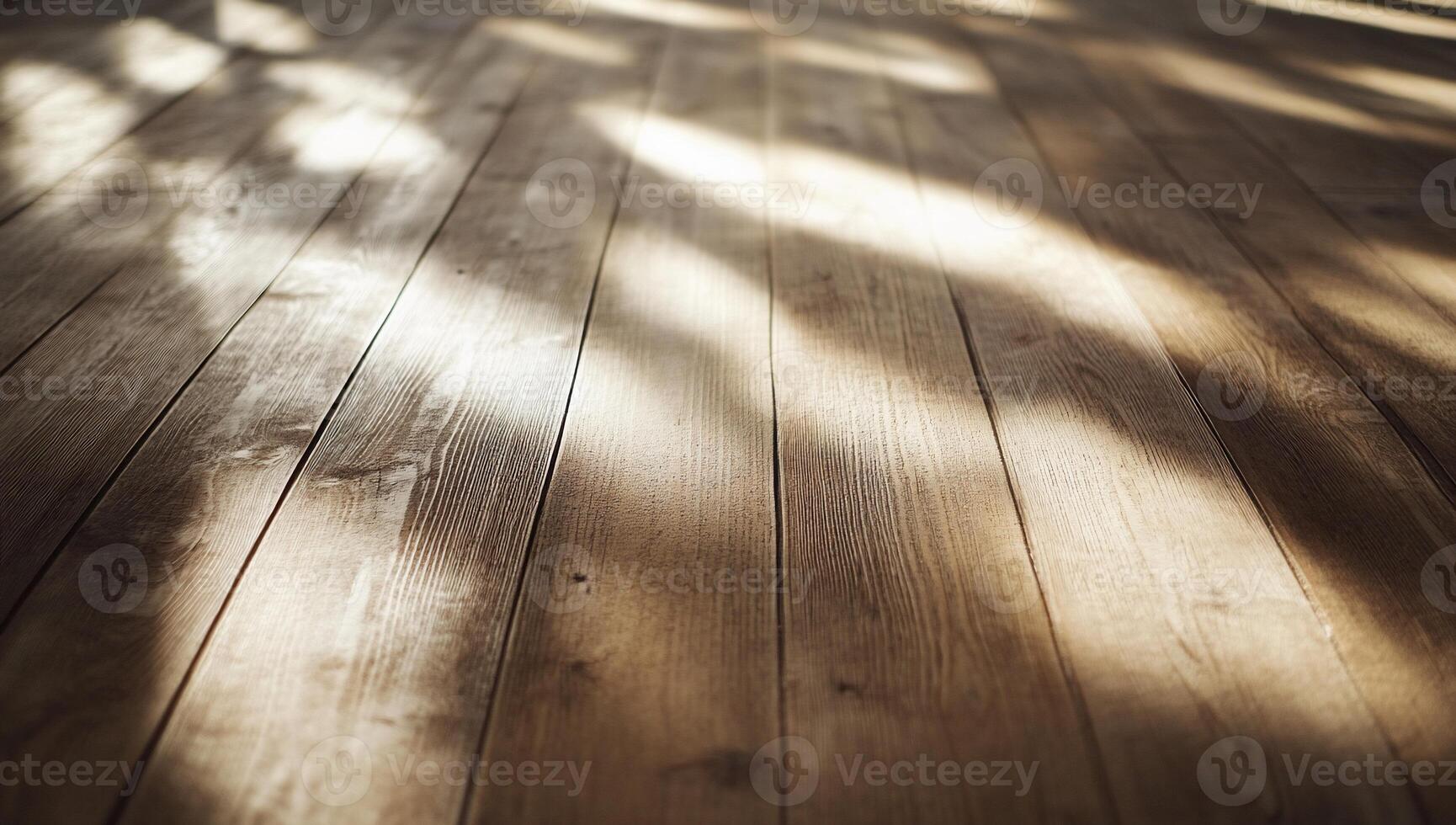 Close-up of wooden floor with natural light and shadows. photo
