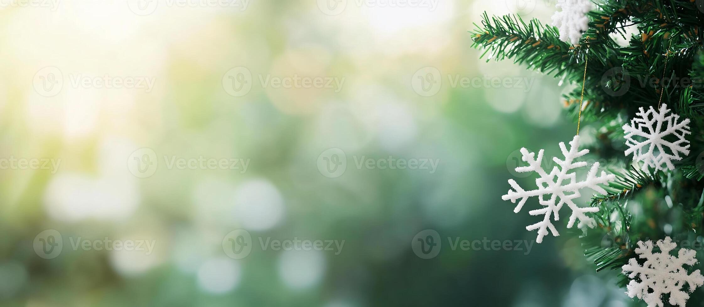 Christmas decorations on a tree with snowflakes photo
