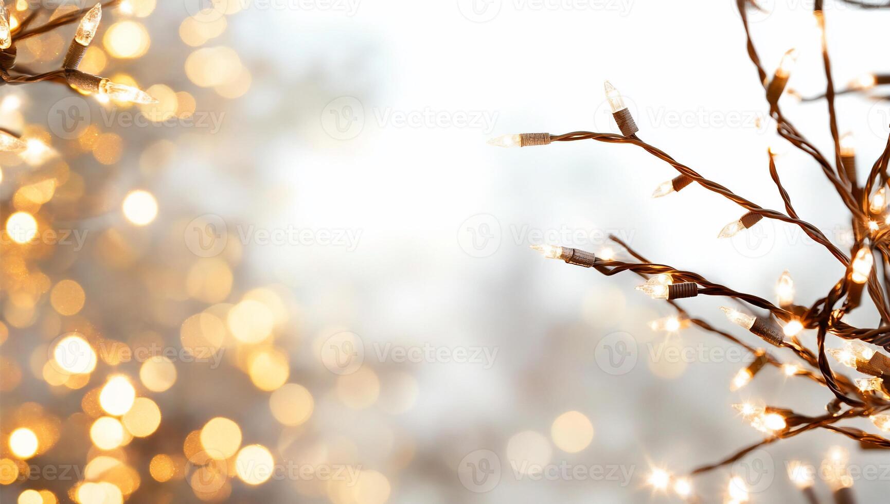 Softly glowing holiday lights against a blurred background. photo