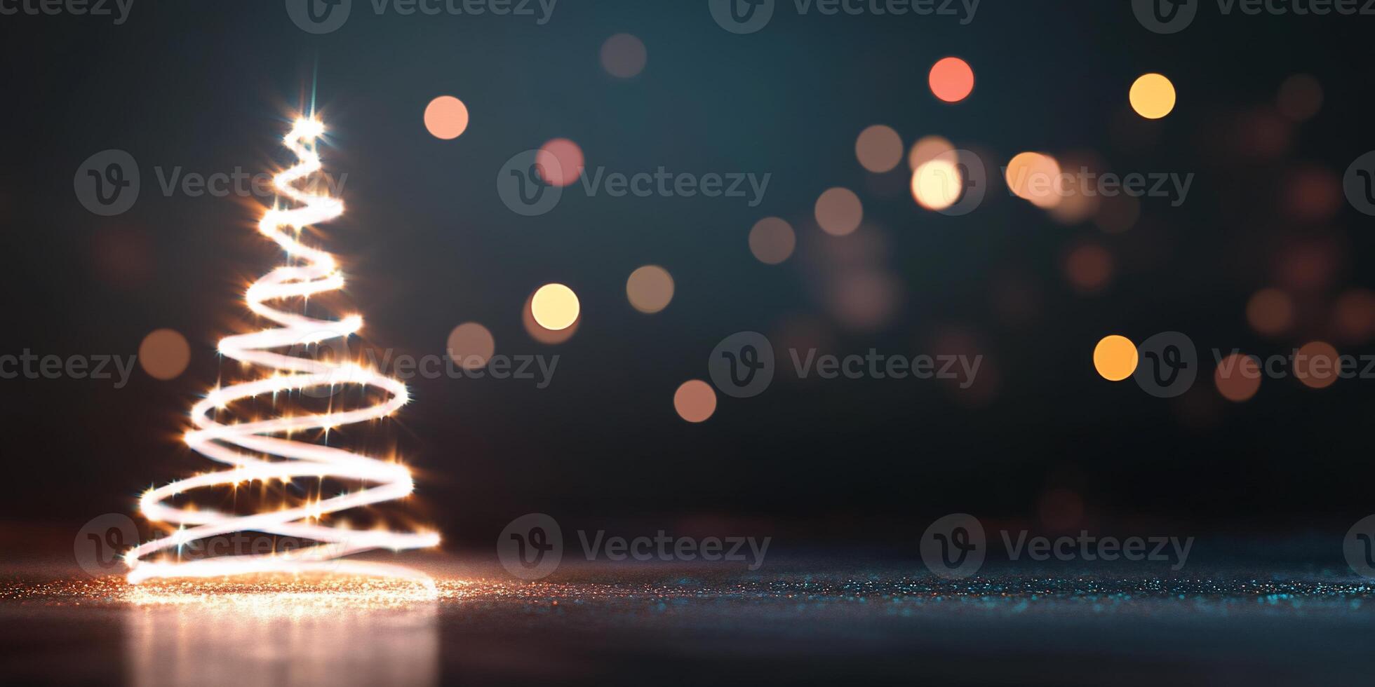 A glowing Christmas tree with colorful bokeh lights in the background. photo