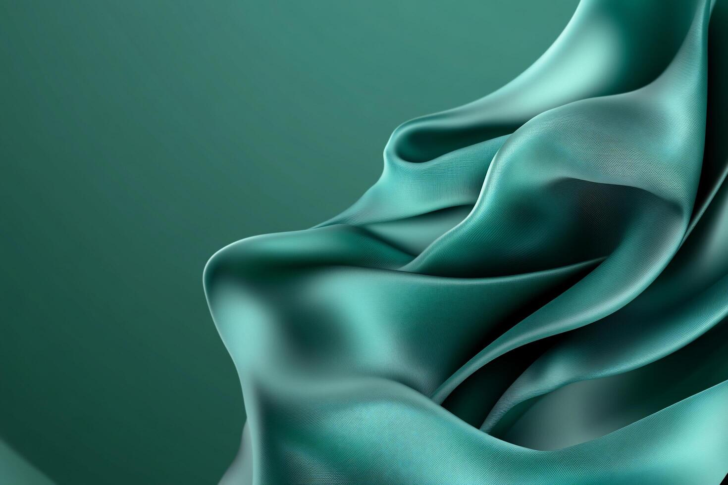 Elegant teal fabric drapes, creating a smooth and flowing texture. photo