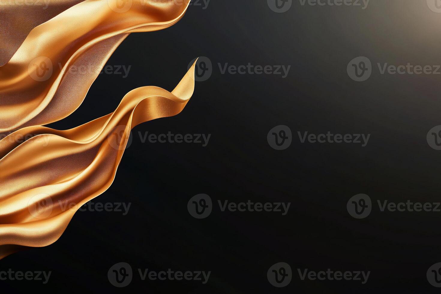 Abstract golden fabric flowing against a dark background. photo