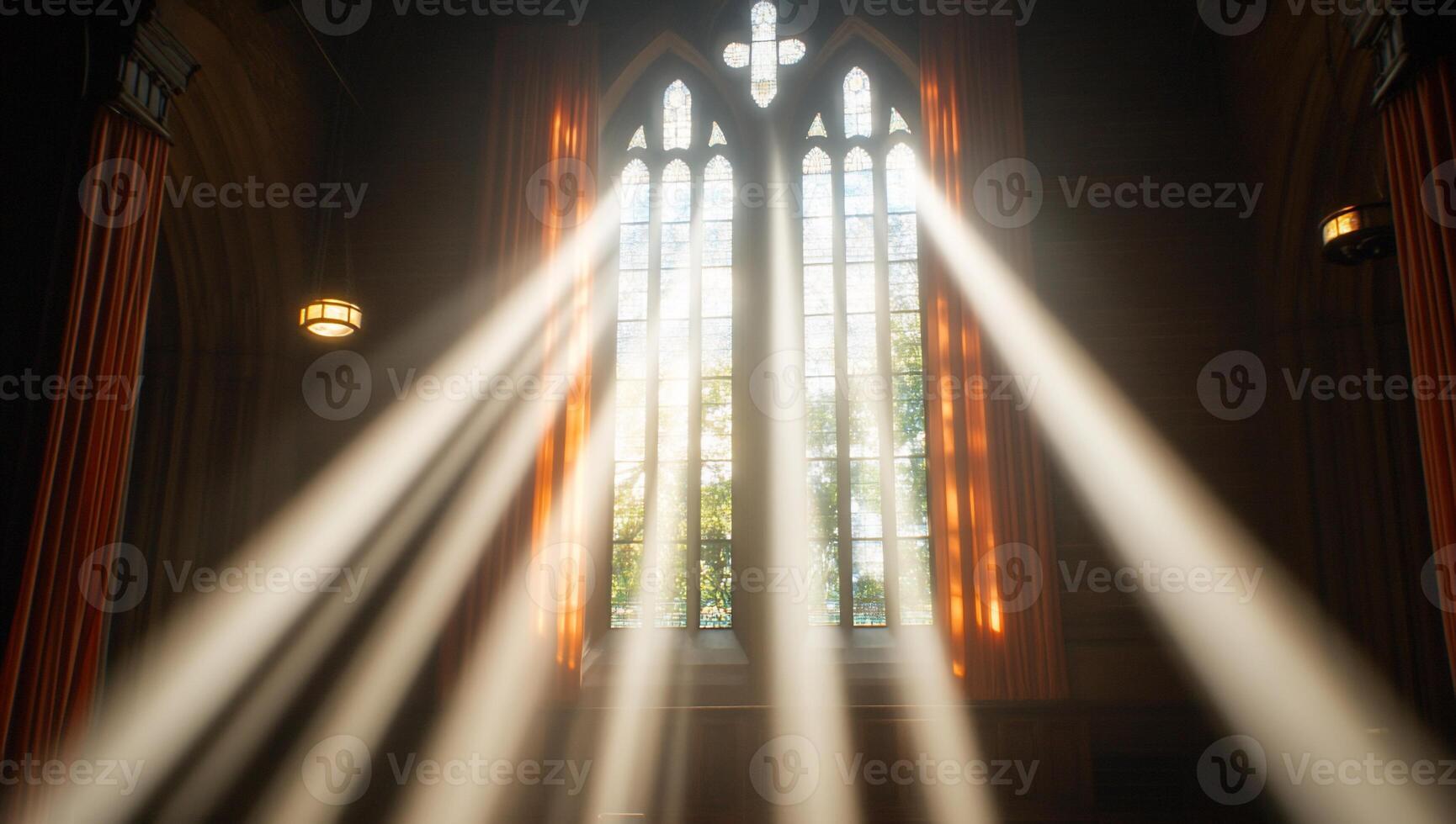 Sunlight streams through a gothic window, illuminating a serene interior. photo