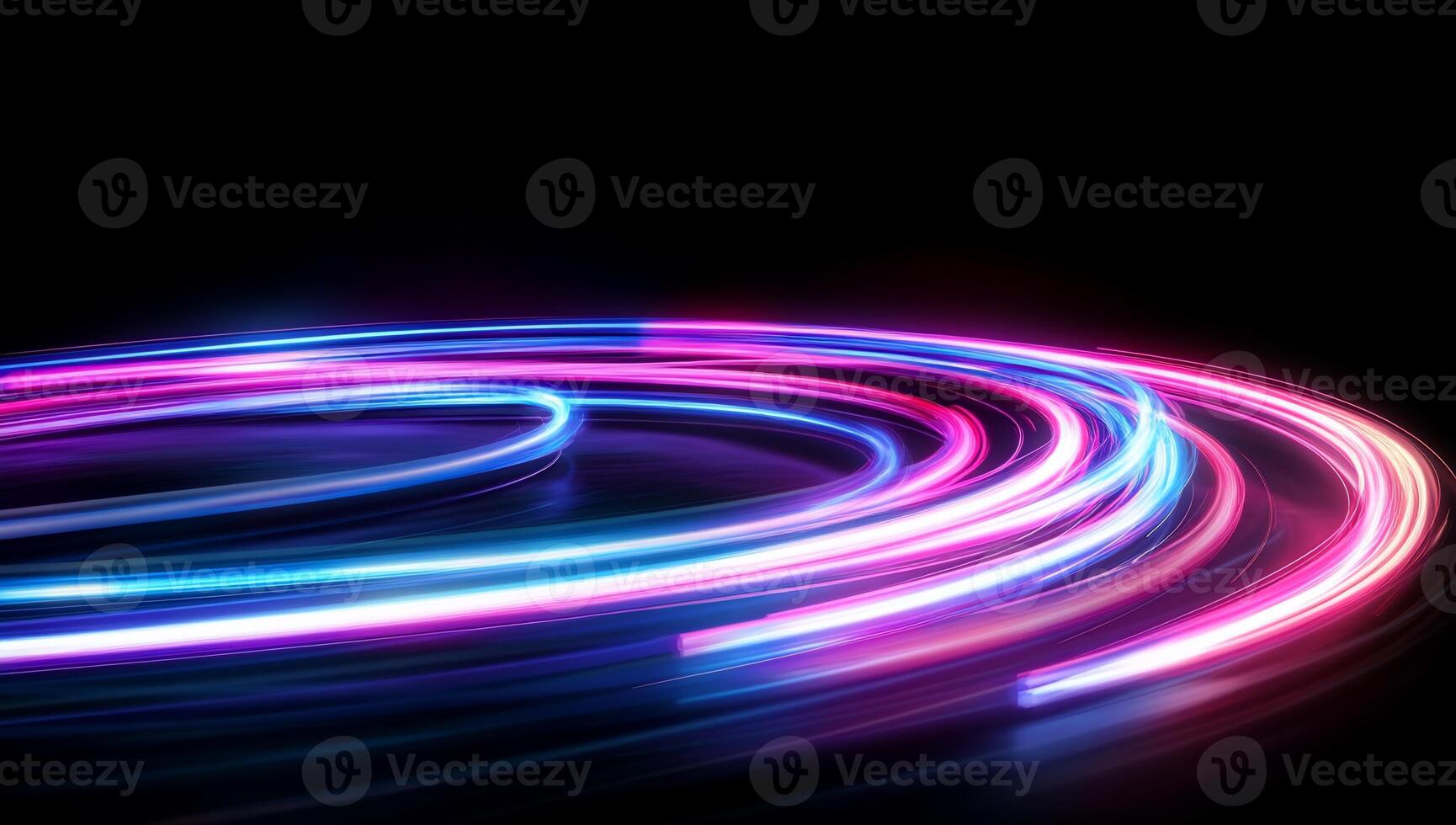 Vibrant light trails swirl against a dark background, creating a dynamic effect. photo