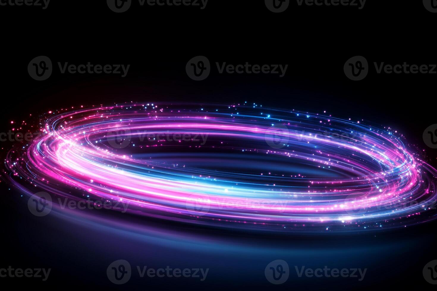 A vibrant swirl of light in pink and blue, creating a dynamic effect. photo