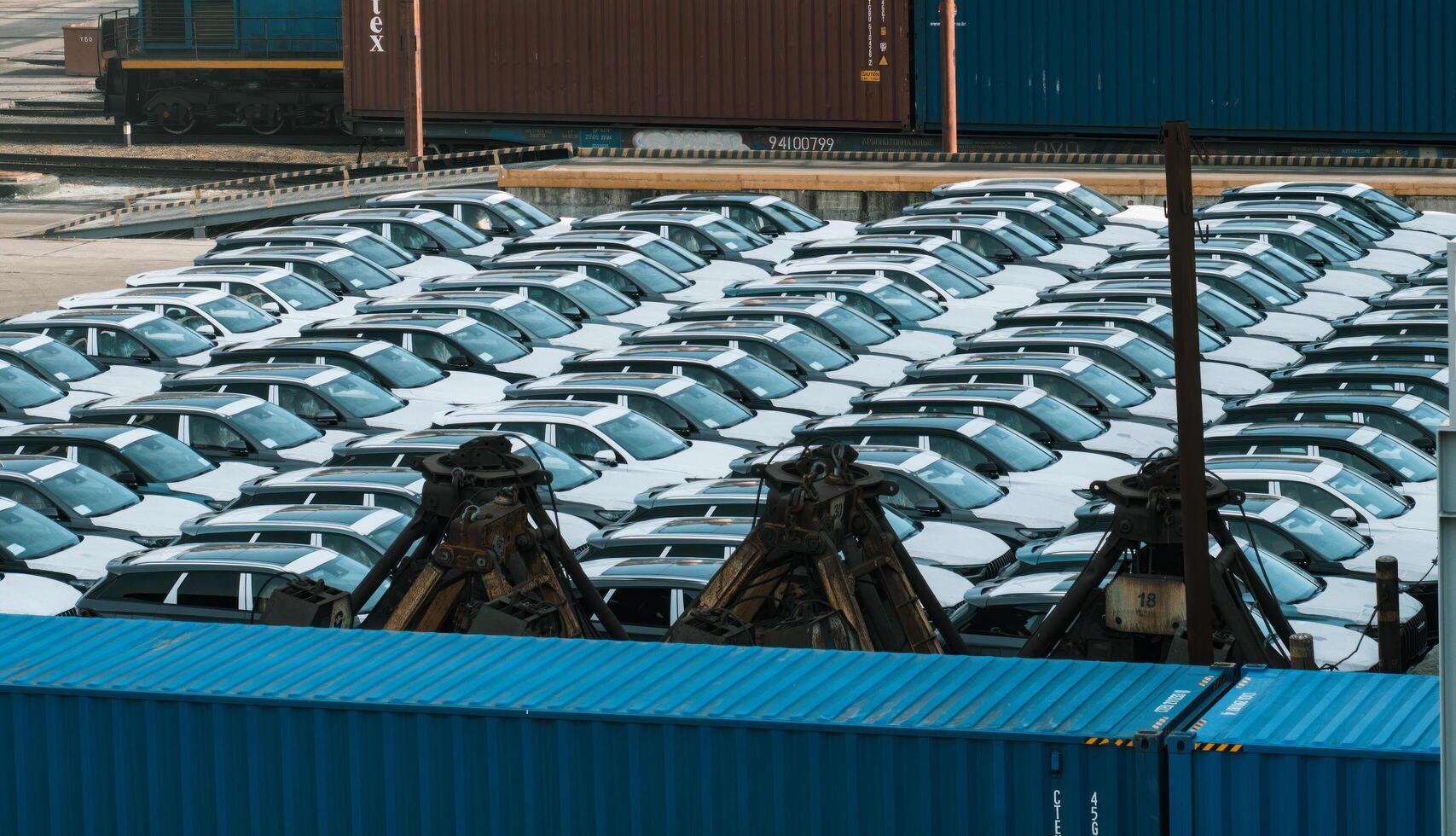 Vladivostok, Russia - 3.03.2024 unloading of new car from the ship in sea port of Vladivostok, Russia, inside of ship photo