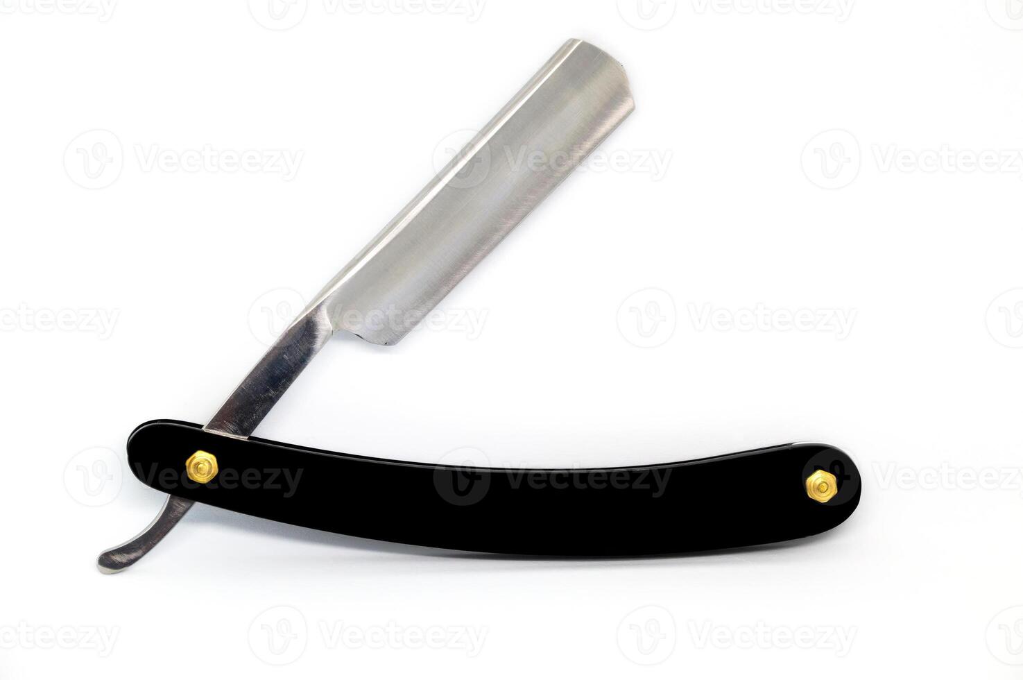 Black straight razor isolated on white background photo