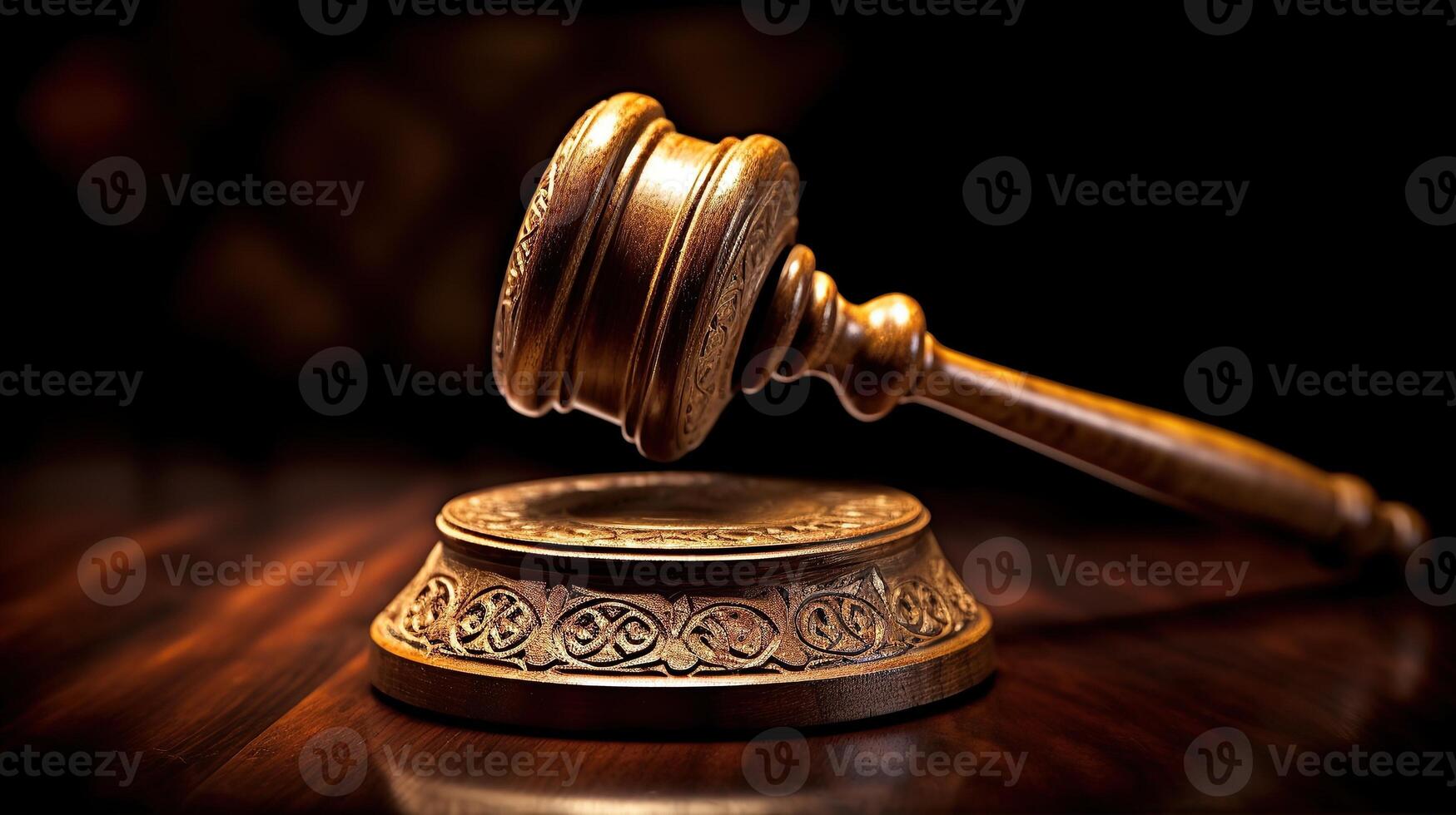 Judge's gavel on wooden table photo