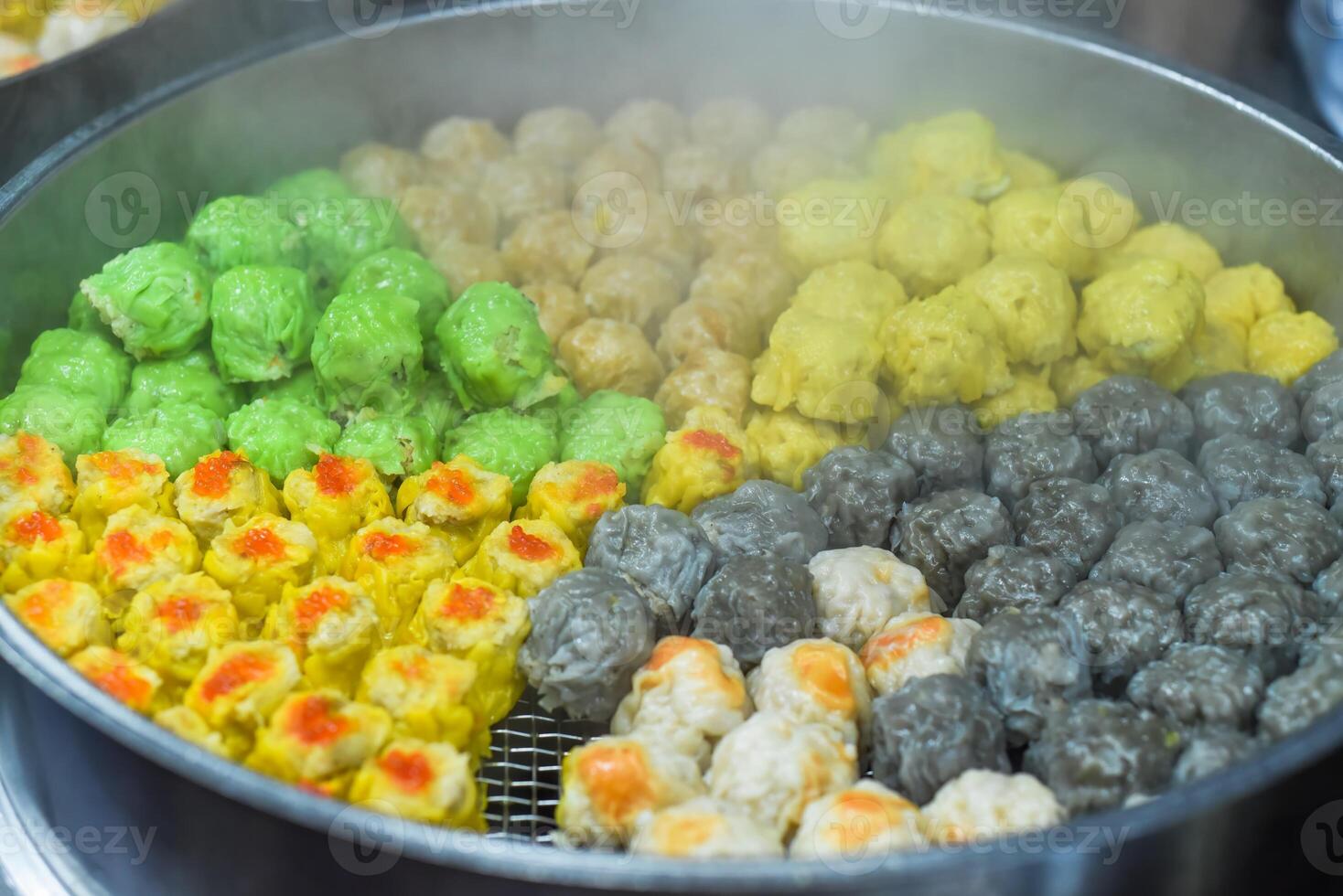 Dim Sum with different fillings in Jalan Alor street food in Kuala Lumpur photo