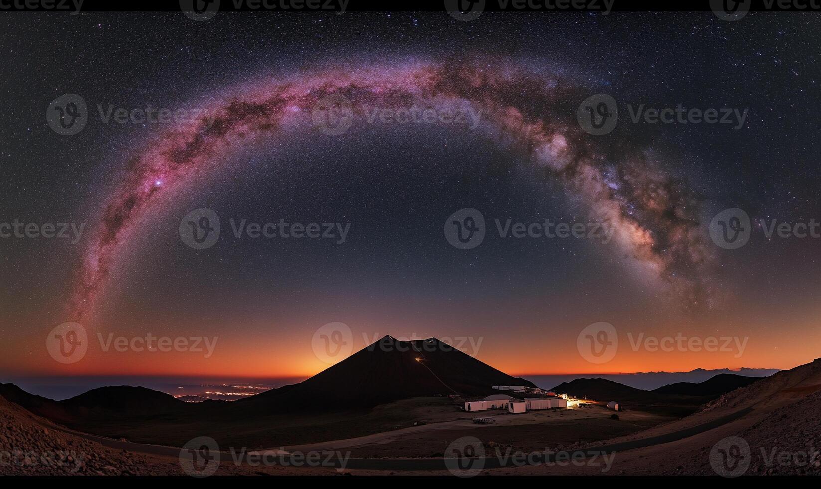 Milky Way arc over volcanic observatory photo