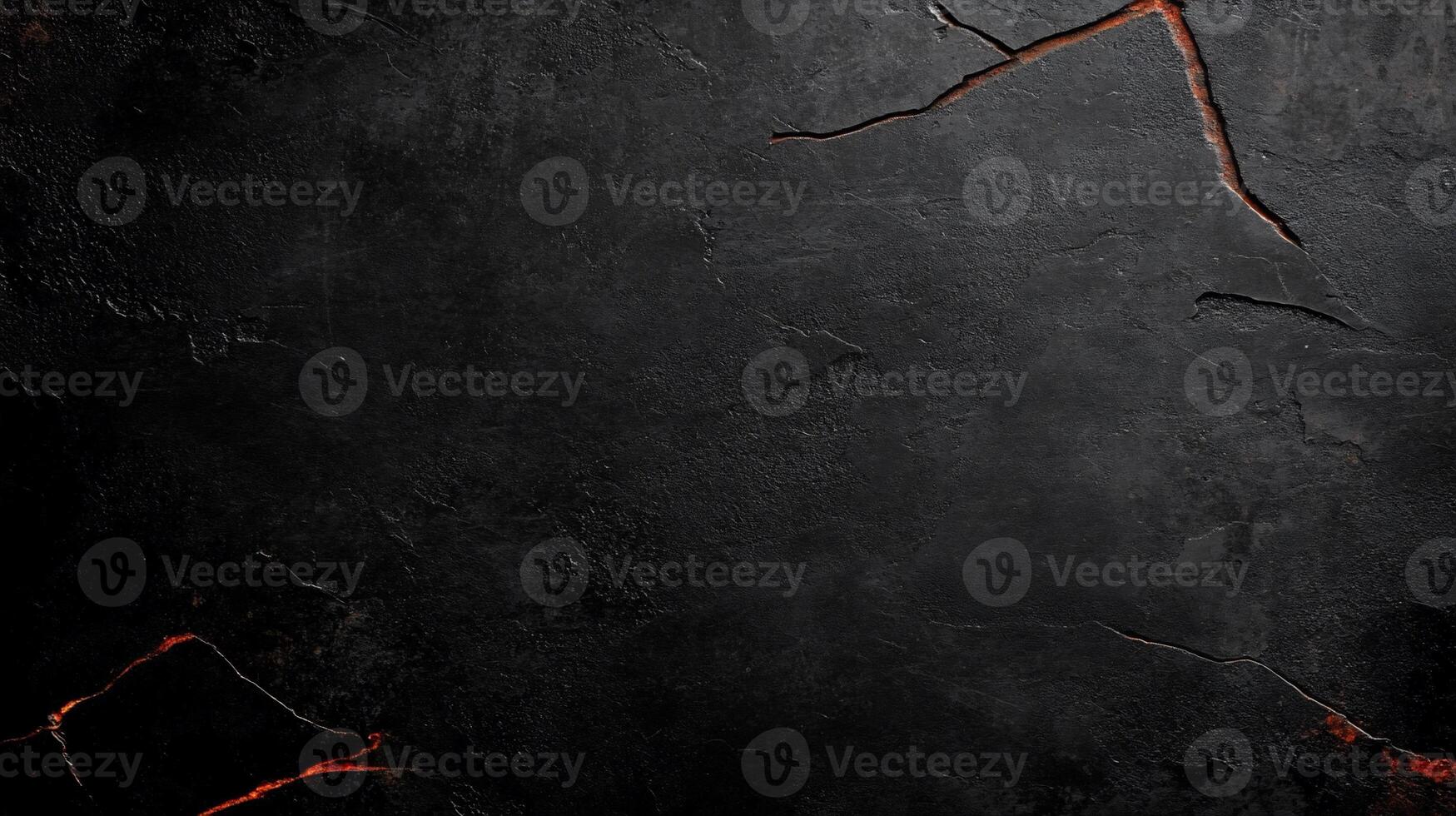 Dark, textured stone surface with cracks photo