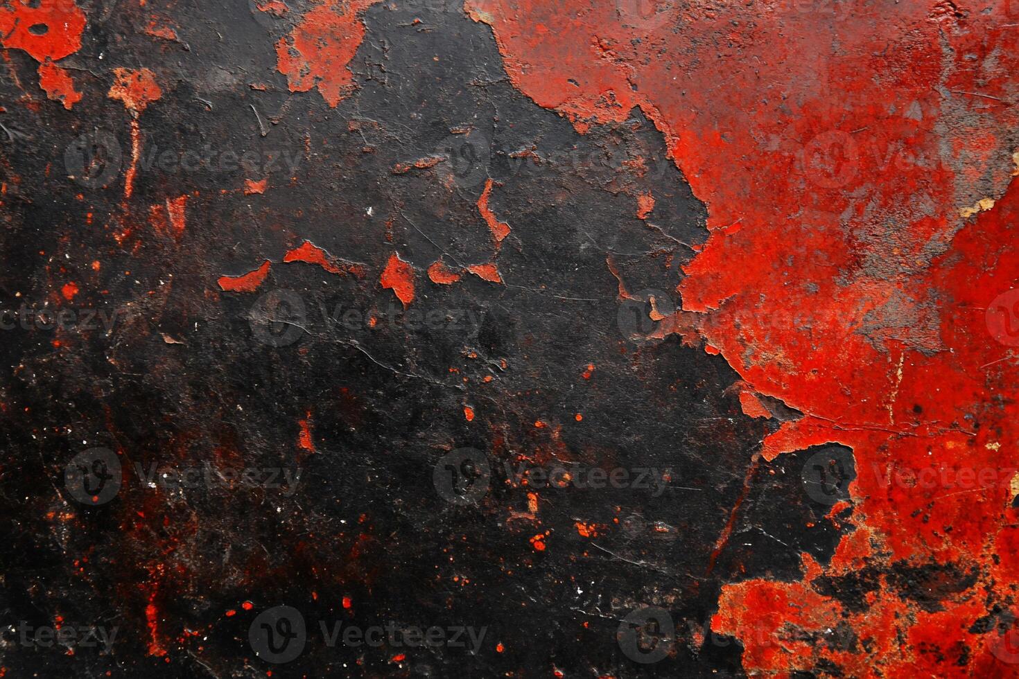 Peeling red paint on dark surface photo