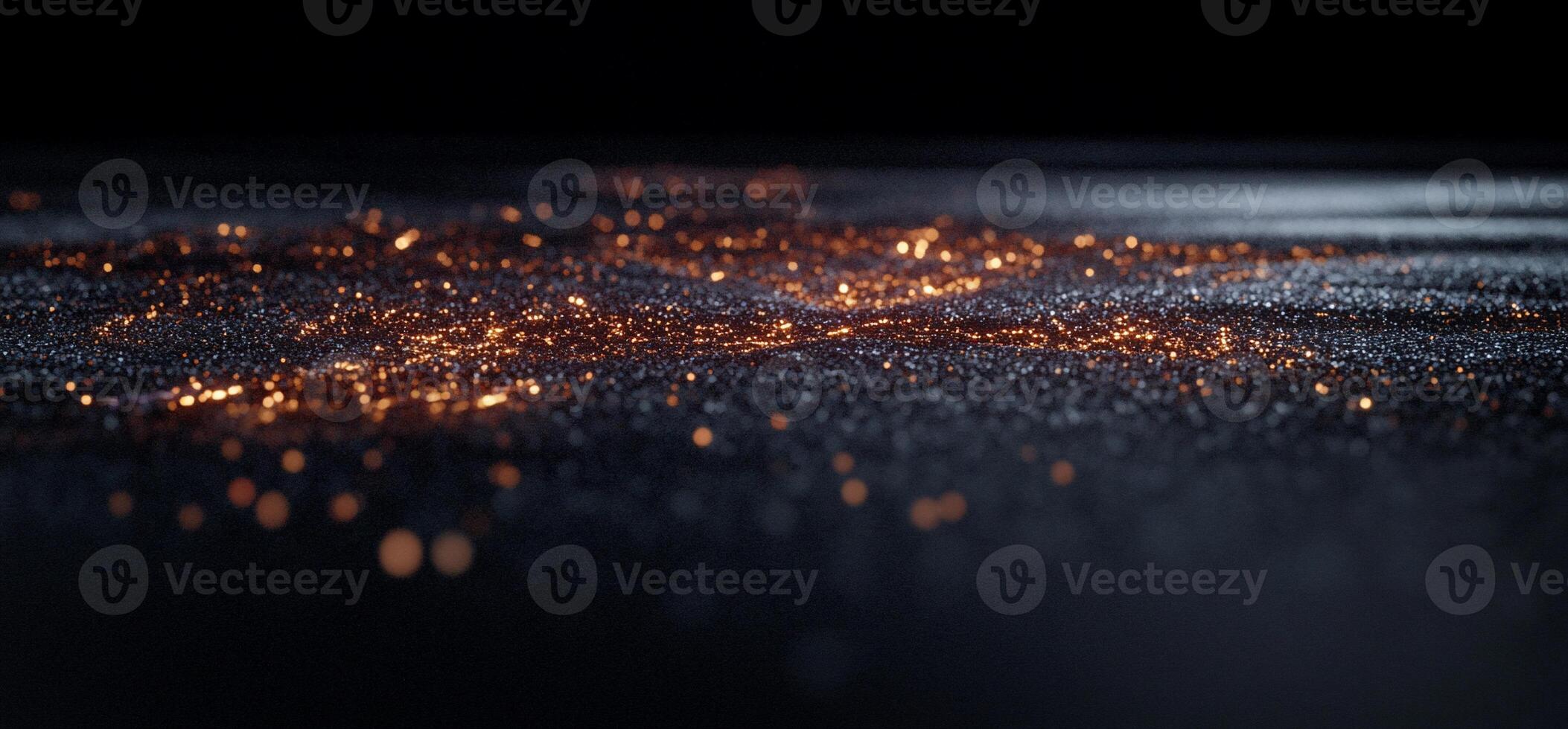 Abstract fiery particles on a dark surface photo