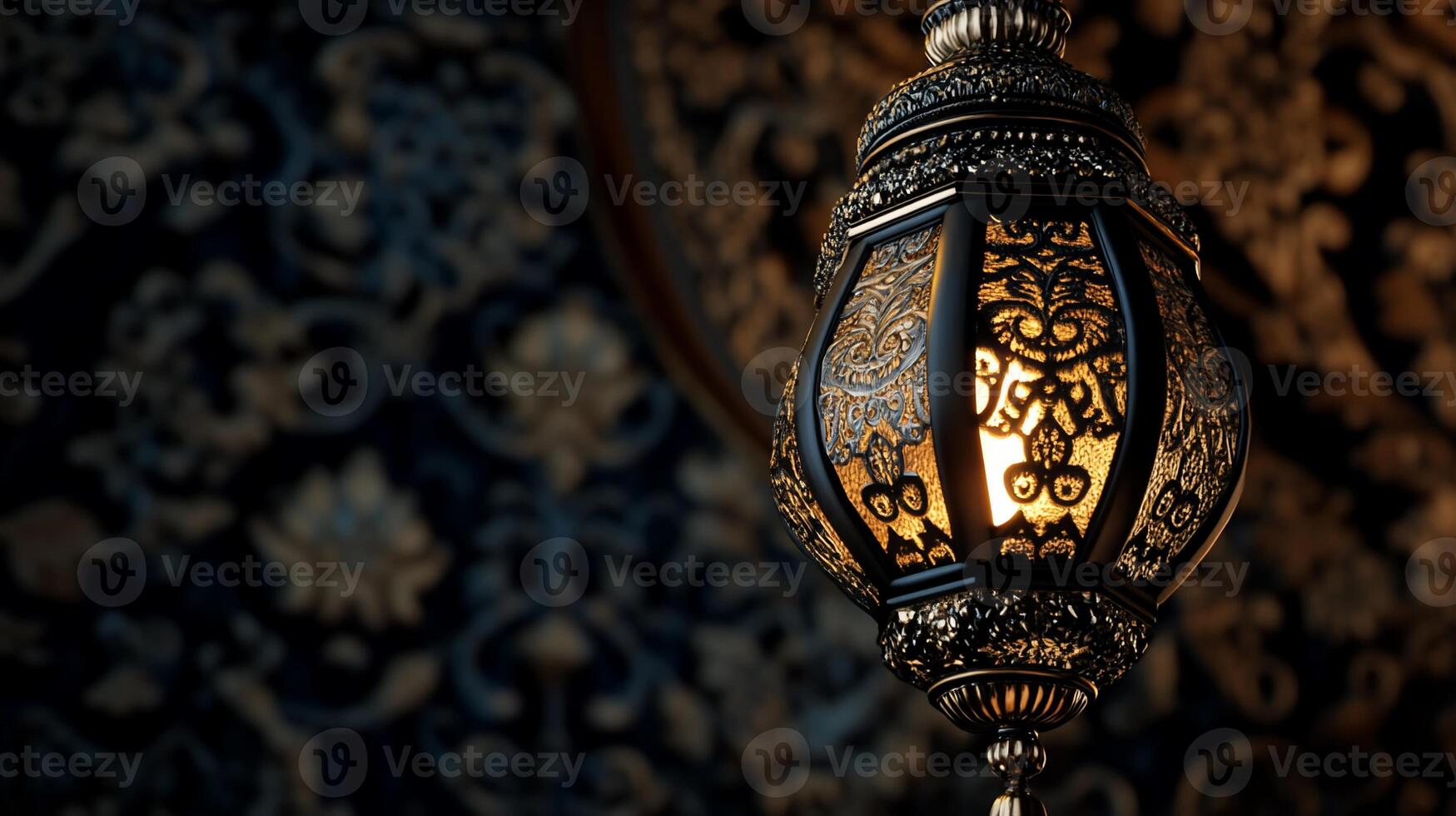 Ornate hanging lamp with intricate details, illuminating a dark backdrop photo