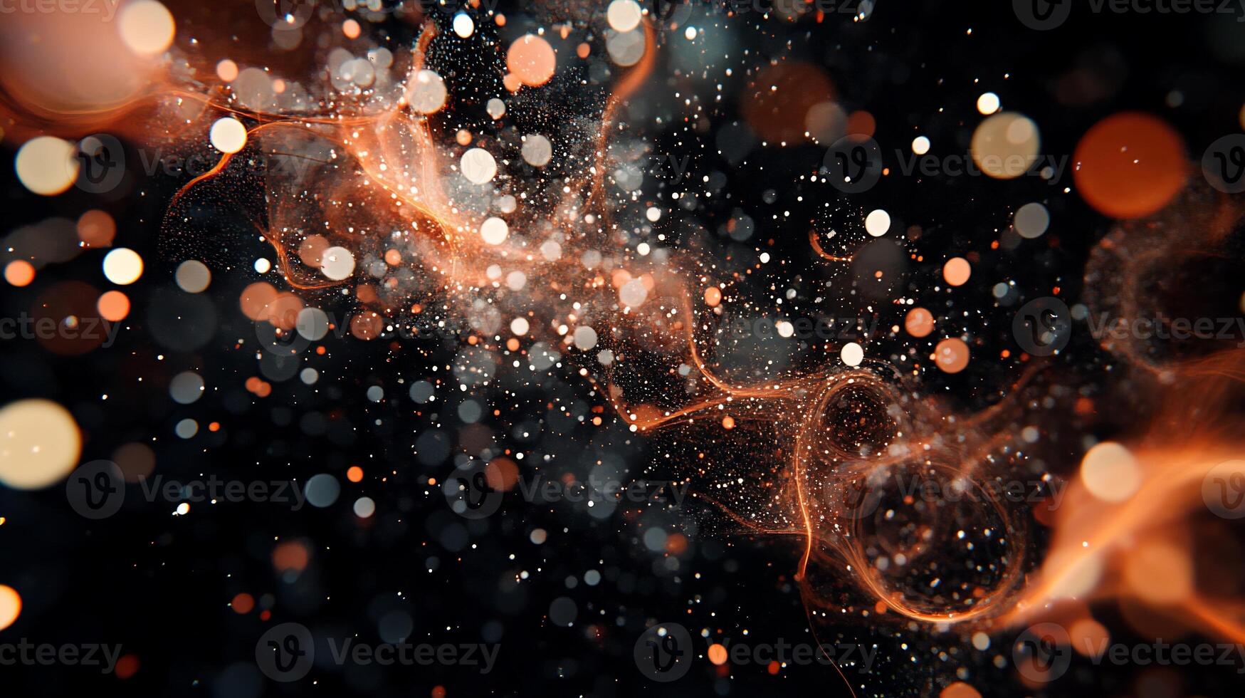 Abstract digital artwork of cosmic particles. A swirling display of fiery particles and glittering dust in a dark space photo