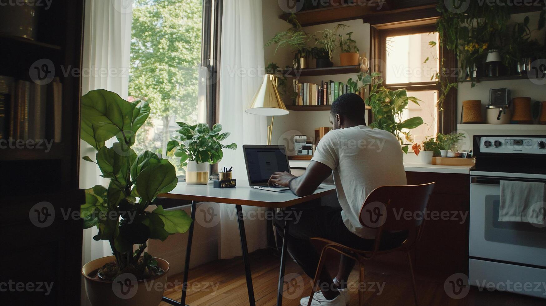 Man working from home in a cozy kitchen photo
