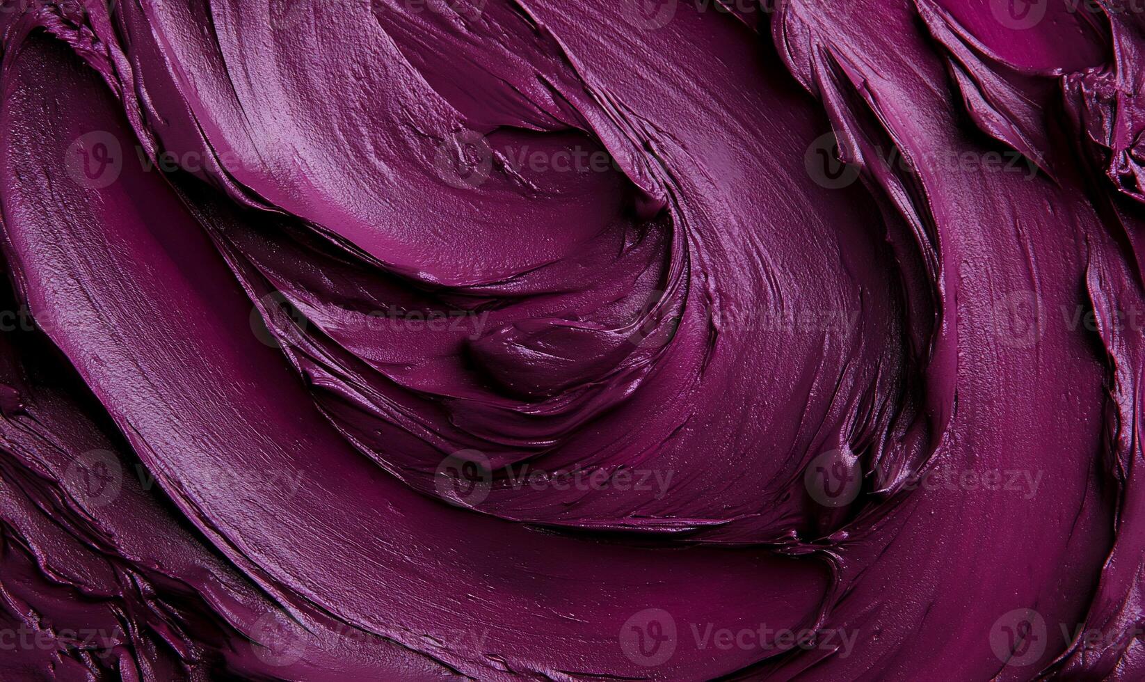 A close up of a purple paint swirl photo