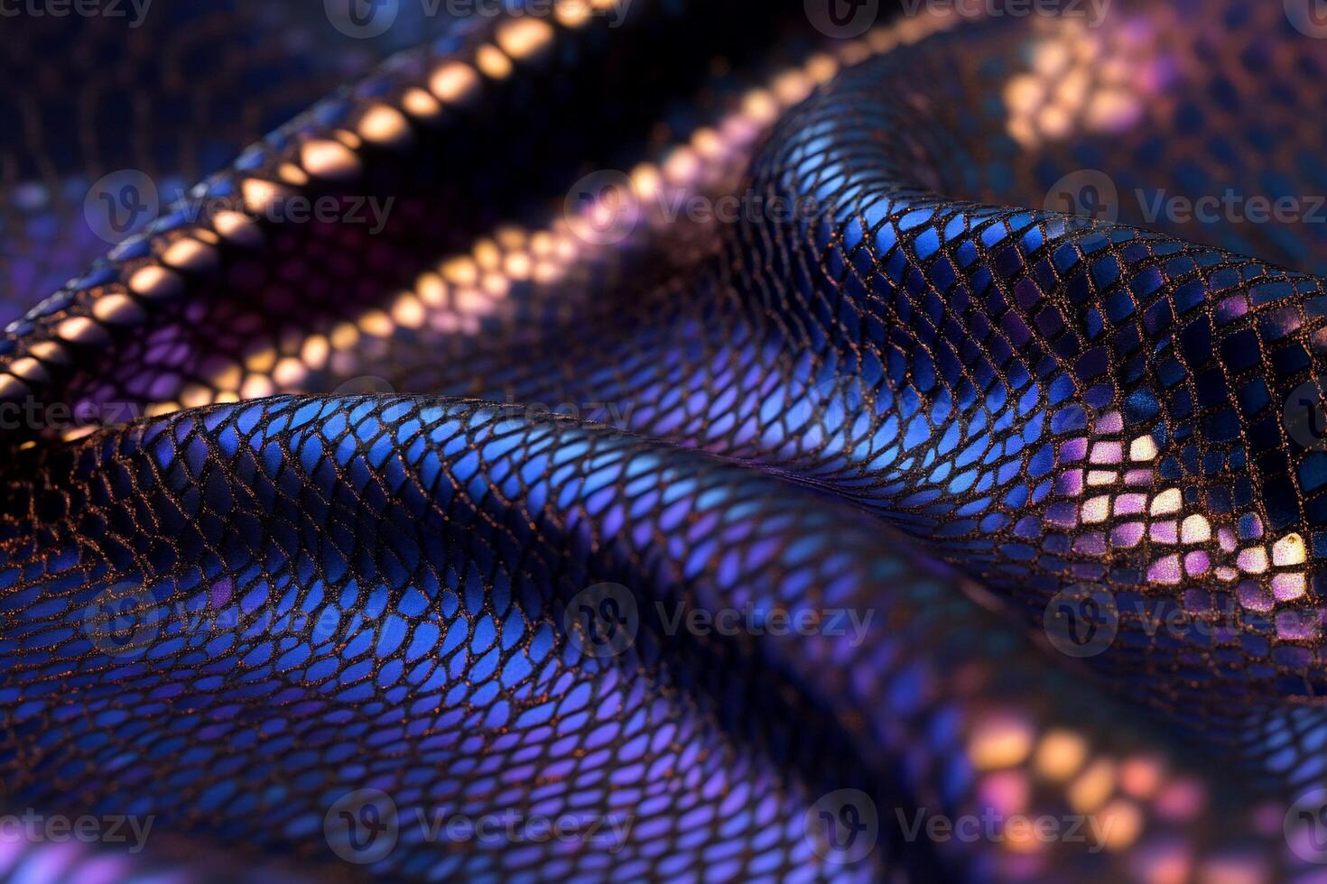 Close-up of iridescent snake skin fabric photo
