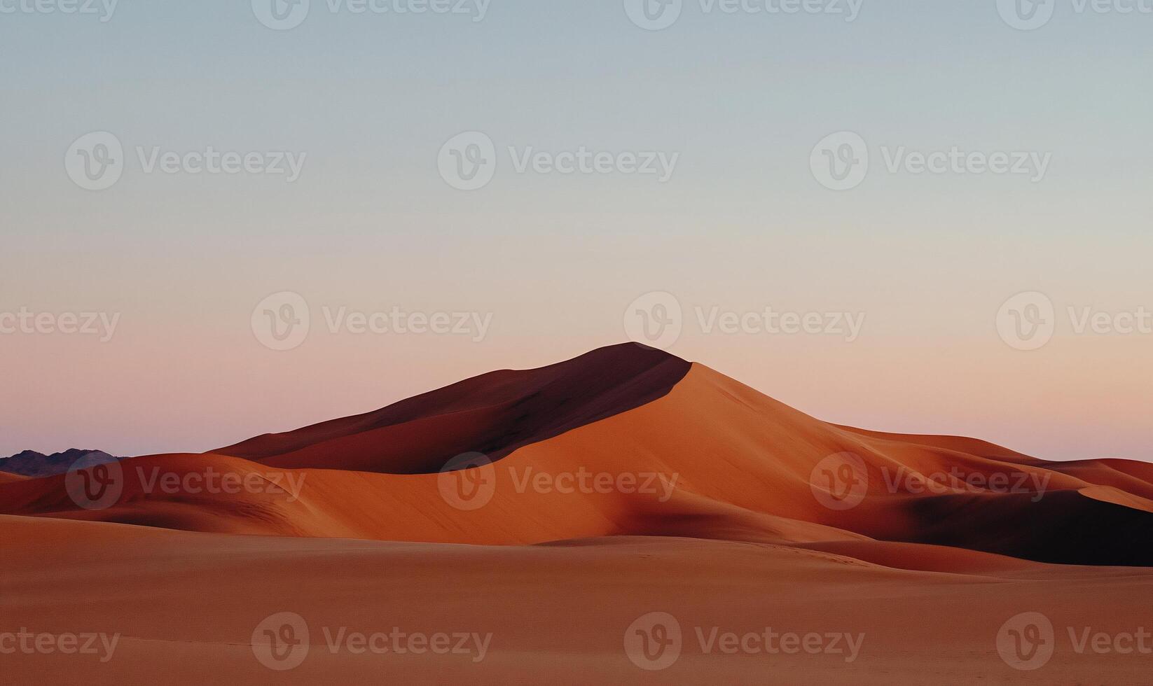 Serene desert dune landscape at sunset photo