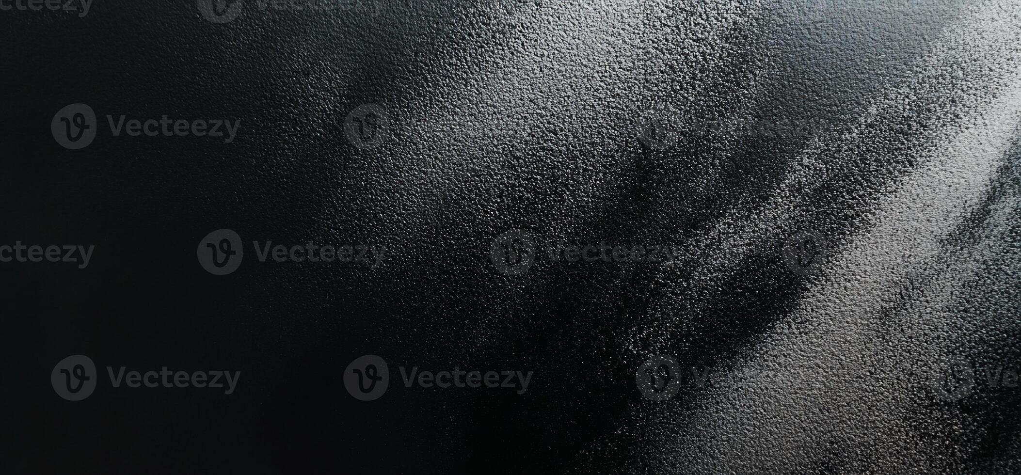 Dark textured background with light dusting photo