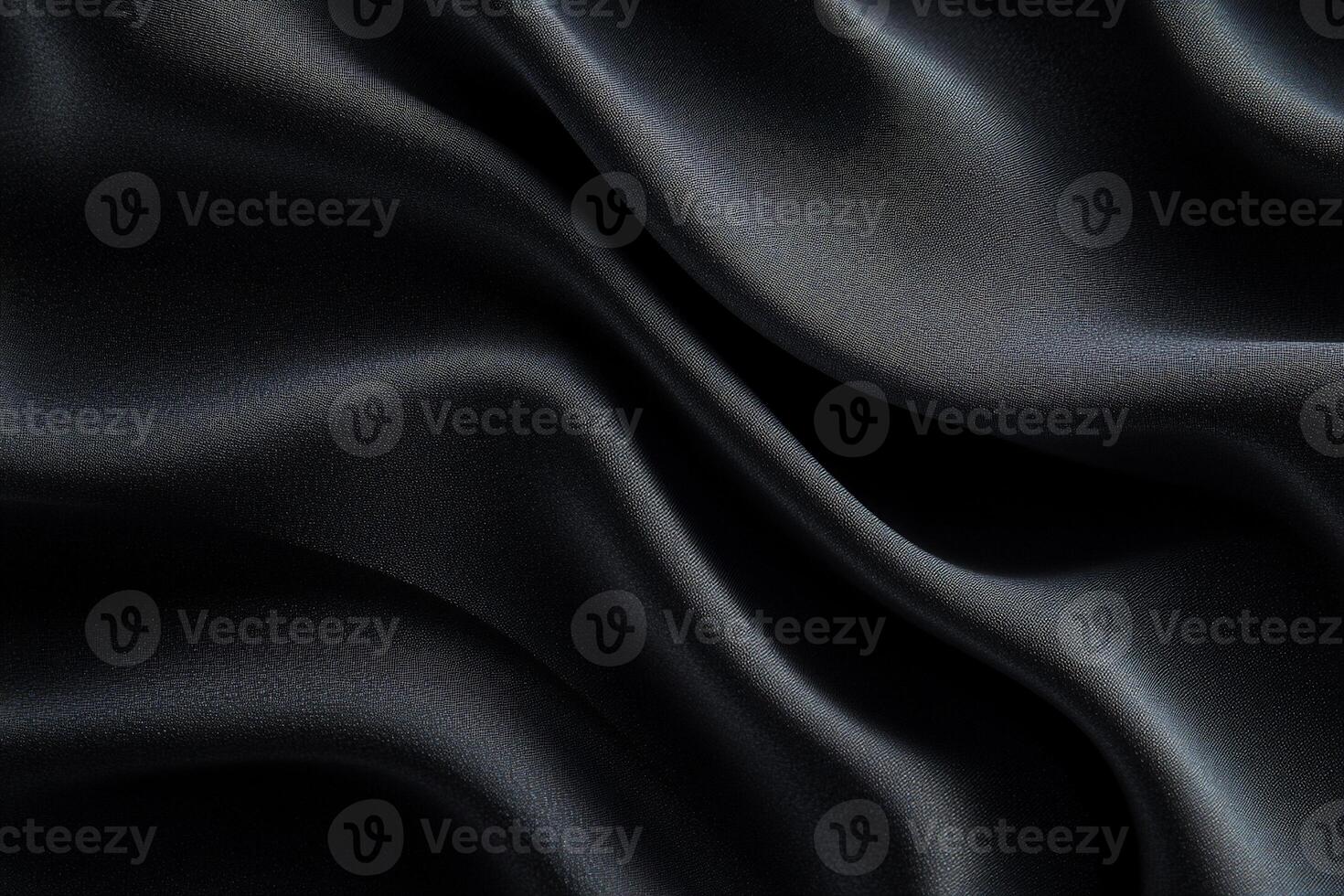 Dark, flowing fabric with subtle sheen and elegant drapes photo