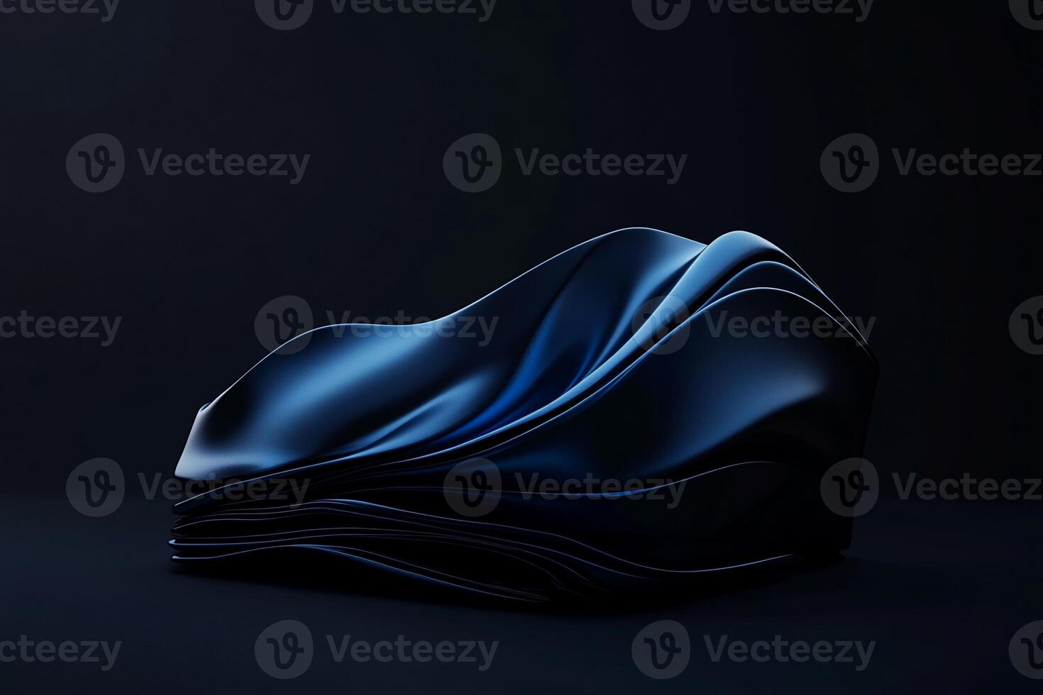 Abstract dark blue sculpted form, flowing fabric-like texture photo