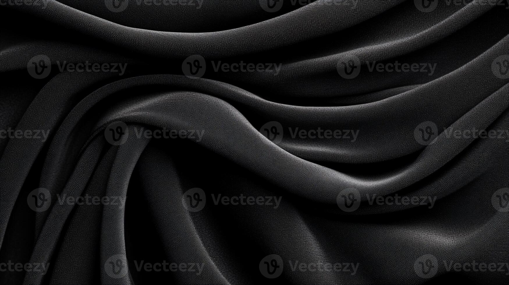 Dark, flowing fabric with elegant, soft folds photo