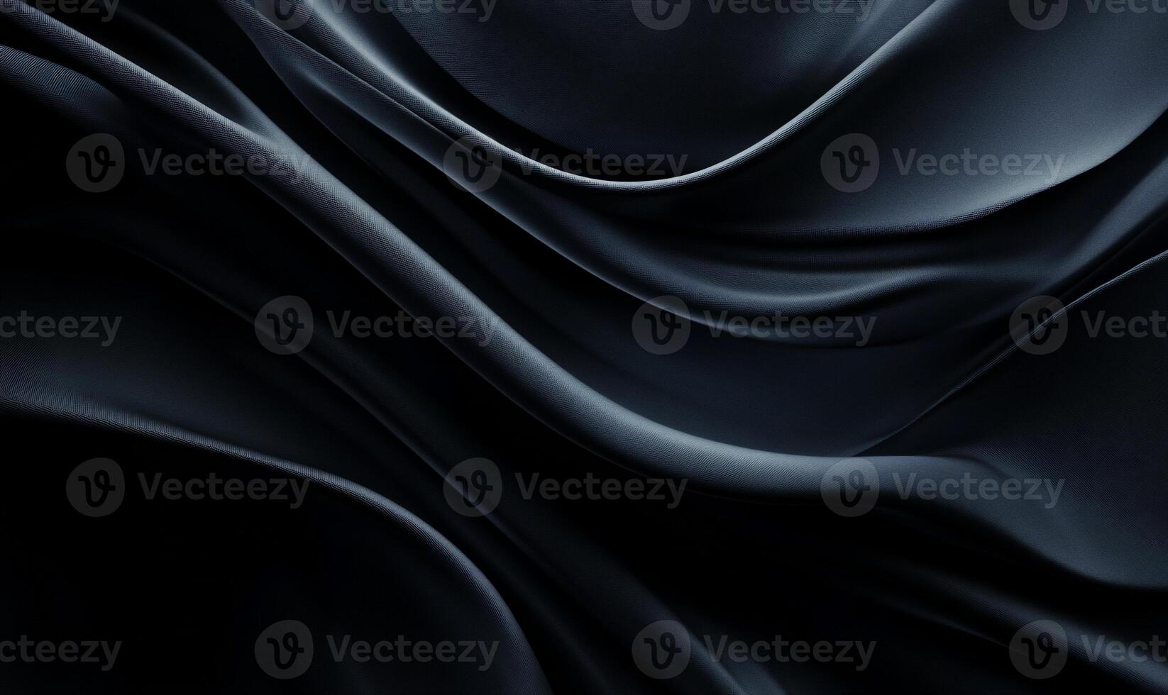 Dark, flowing fabric with elegant, smooth curves photo