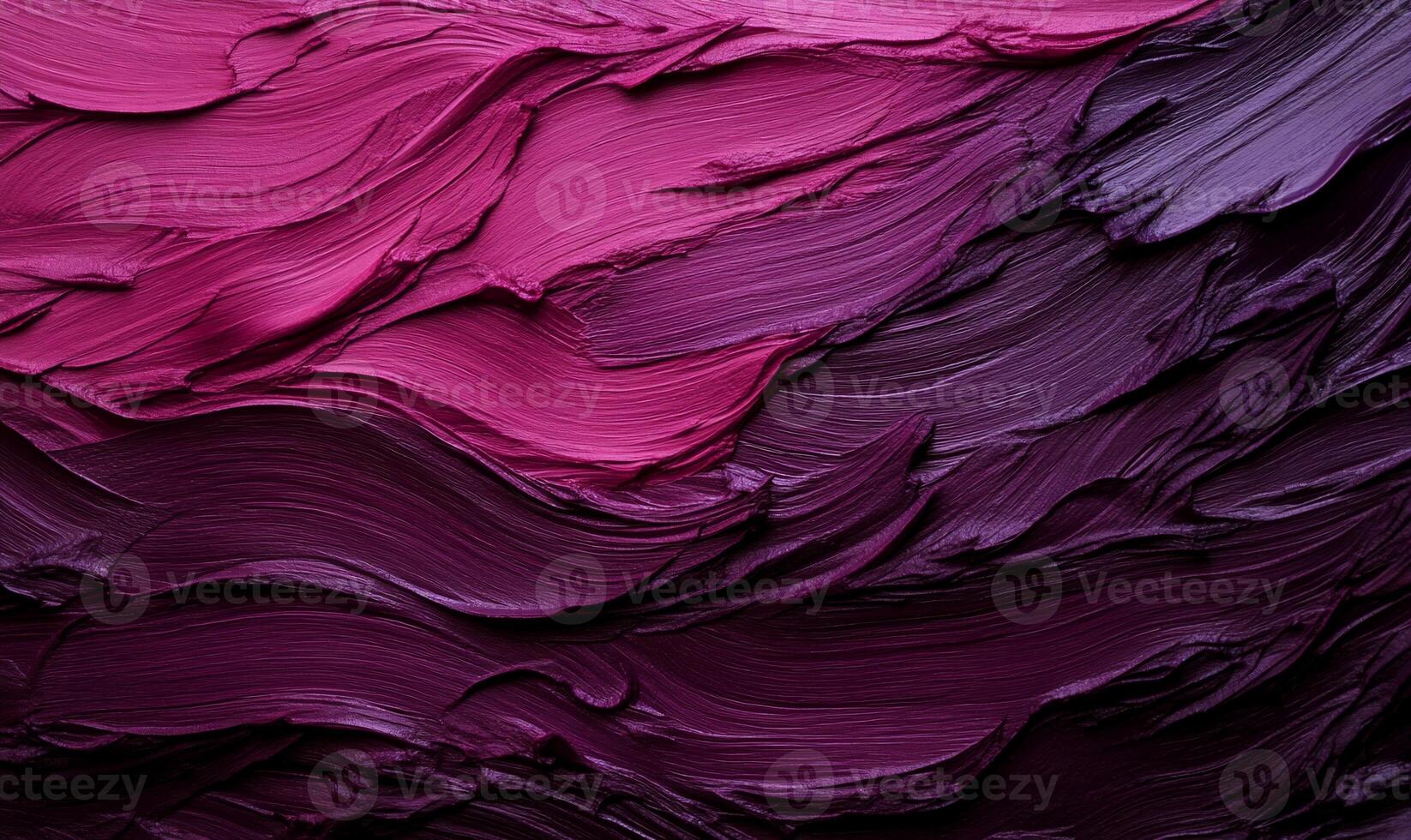 Swirling shades of deep pink and purple paint photo