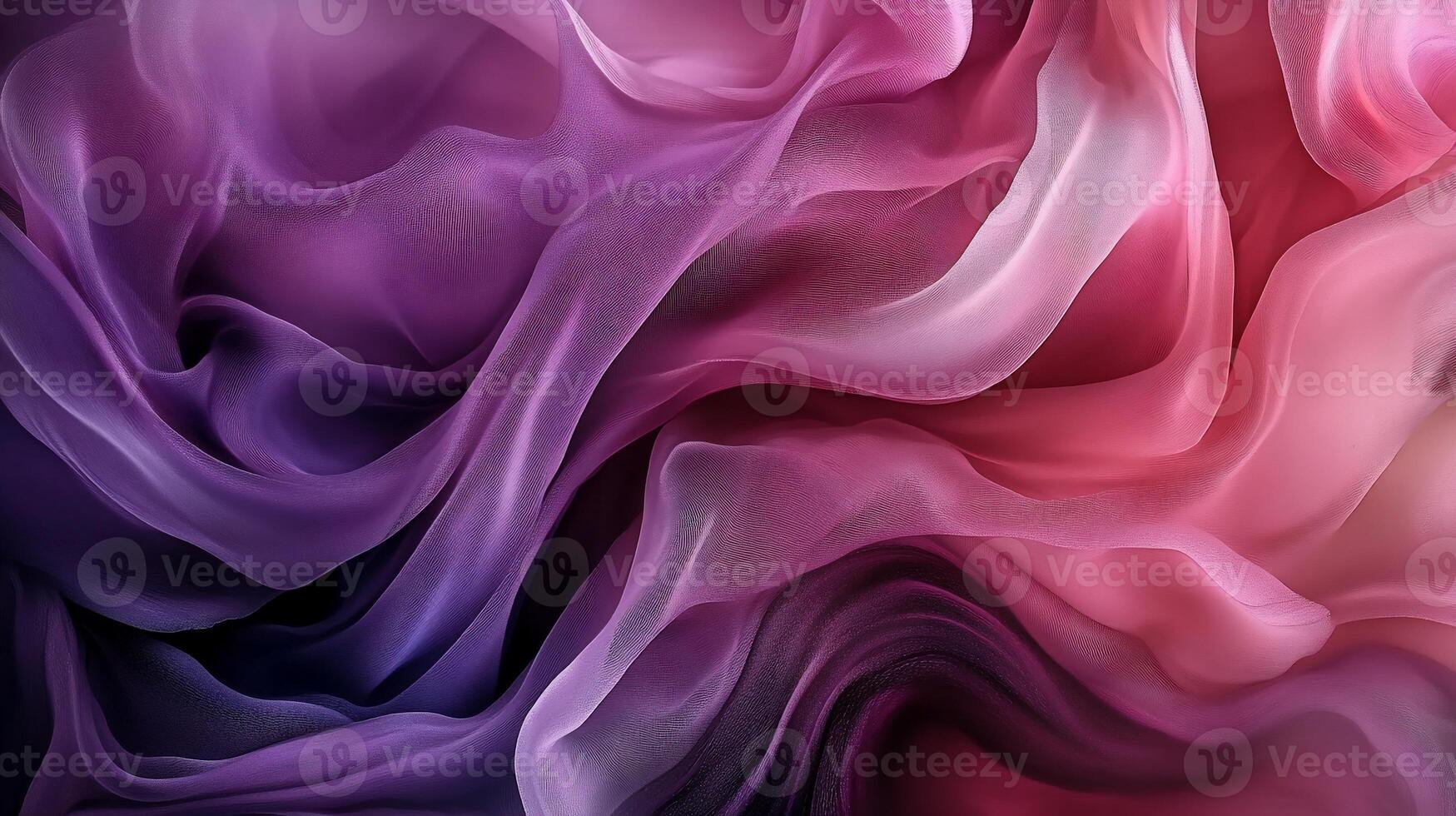 Delicate, flowing fabric with a vibrant ombre gradient of pinks, purples, and blues photo