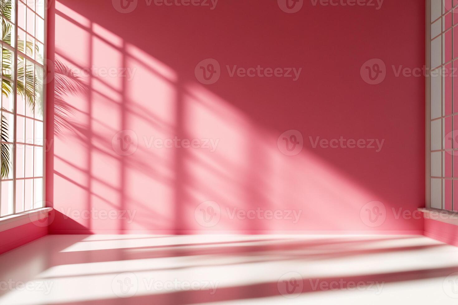 Sunlit pink room with large windows, casting shadows on walls and floor photo