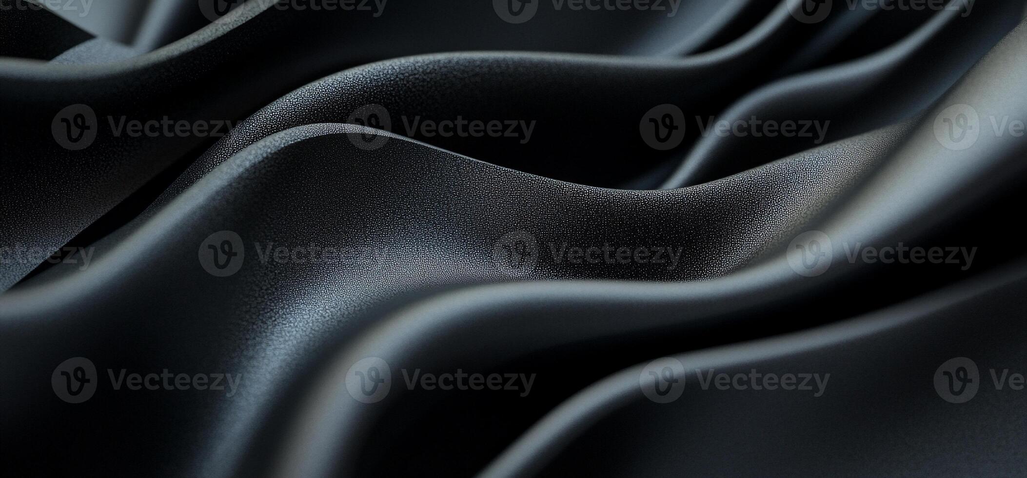 Dark, flowing fabric with soft, elegant waves photo